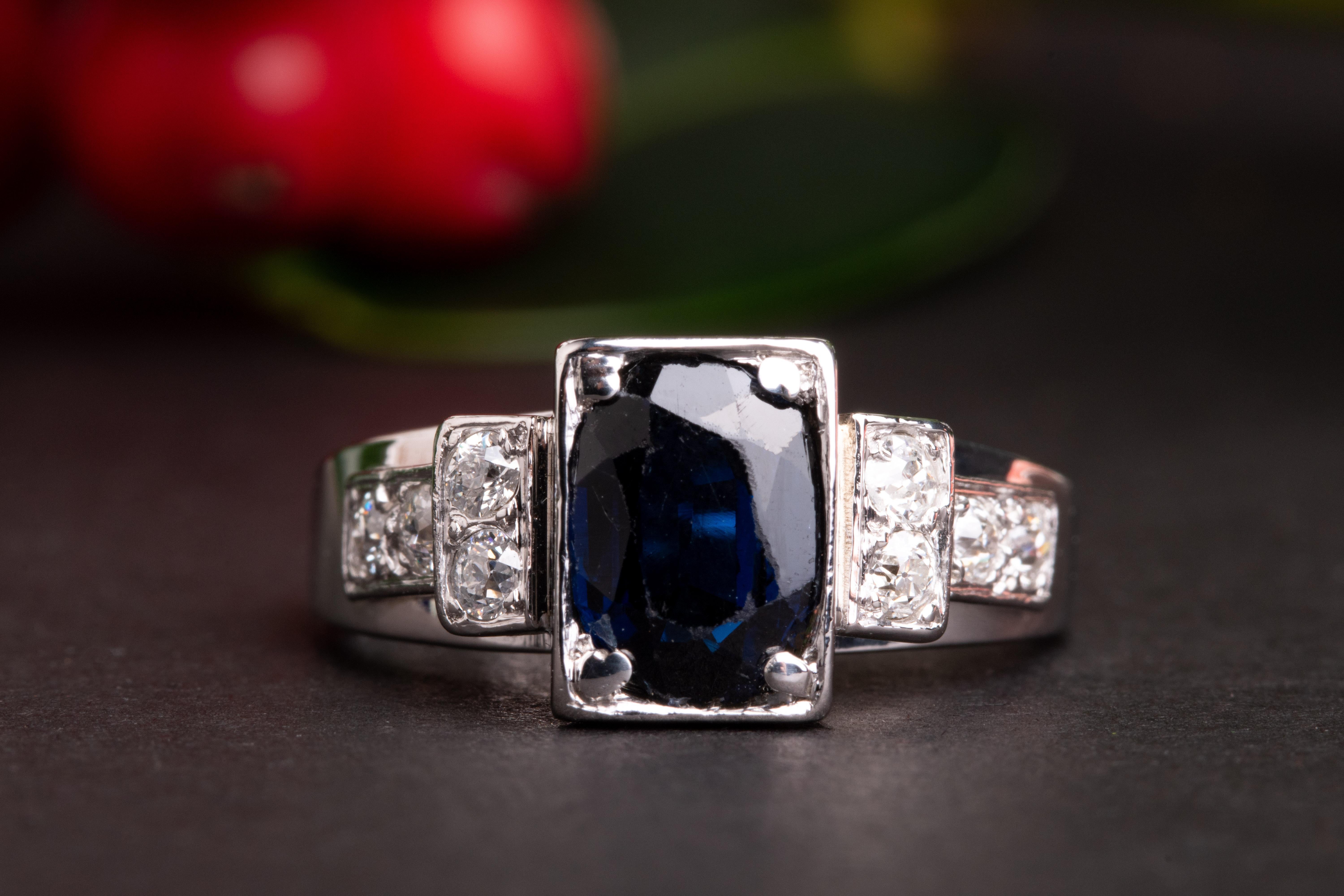 art deco emerald cut sapphire ring