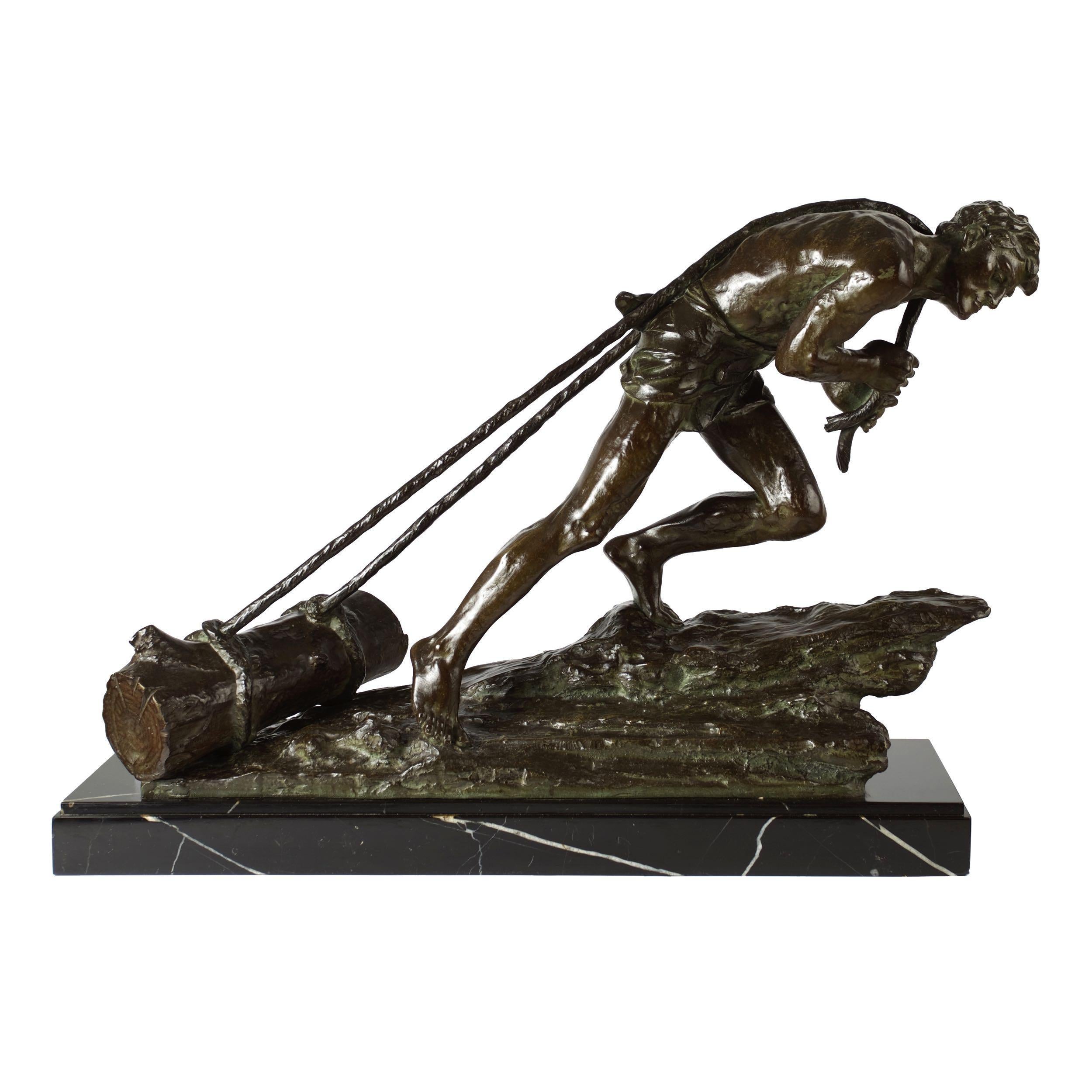 An incredibly powerful model from Edouard Drouot's collection of labor studies, it captures a lone figure dragging logs through the mire with two ropes stretched taught over his back. Only a slight garment protects him from the elements as he