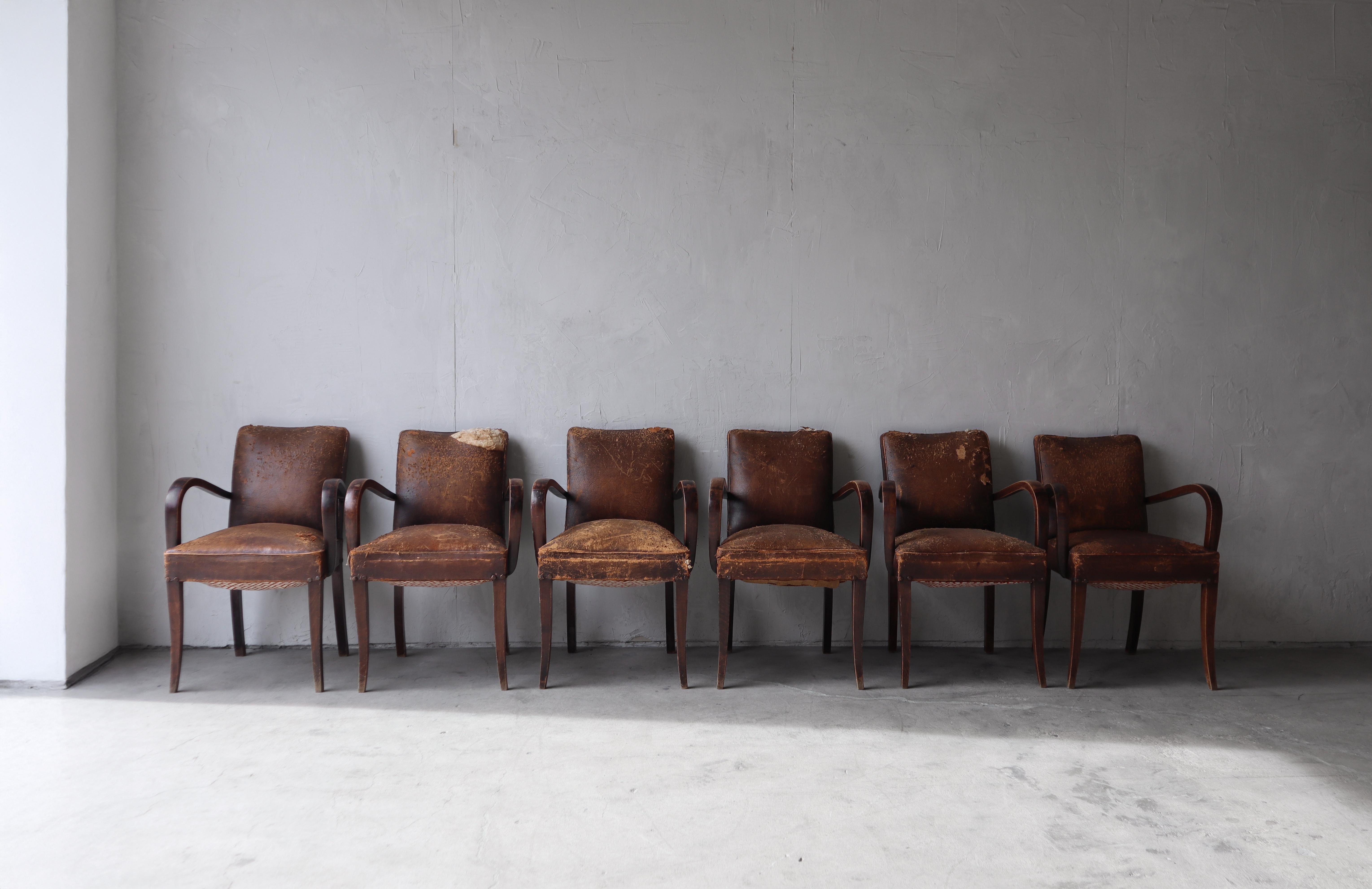 Absolutely stunning set of early French Bridge Chairs.  If you love patina and beautifully aged antiques left in their well loved, as found condition, you will adore these leather beauties.

Every detail of them has been left untouched, with their