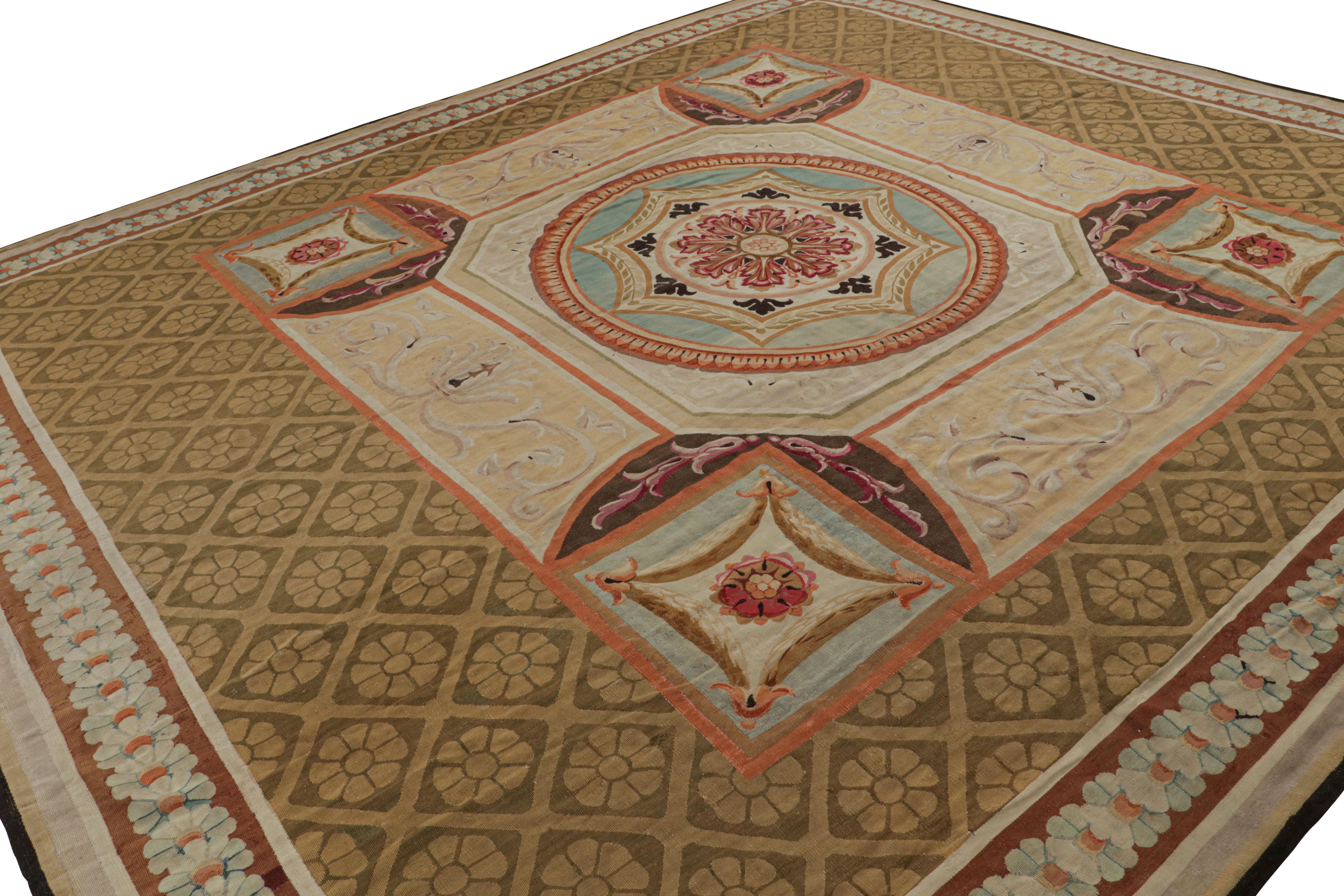 Handwoven in wool, this 12x14 French Antique Aubusson rug features a play of medallion and all over style with floral patterns particularly acanthus motifs, the curvaceous garlands in the stylistic details and a lattice underneath.  

On the design: