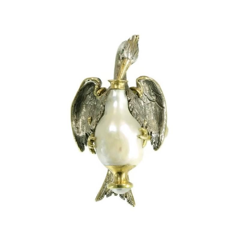 This French 18K yellow gold and silver Victorian object d'art is a depiction of substance in many ways. With its wide gold outlined wings, crest and tail, the silver downy stork triumphs audaciously with an amphora crafted from a grand natural