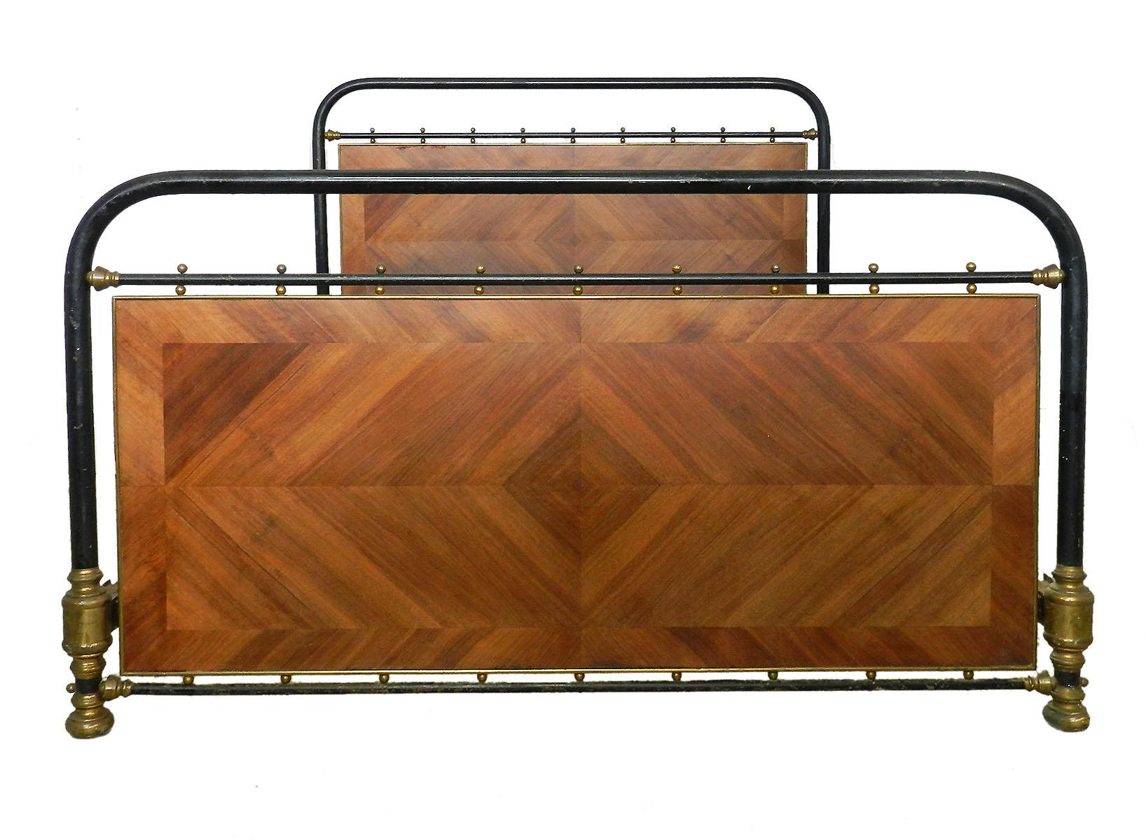 French bed circa 1910 US Queen or UK King size
Brass and iron with wood quartered panels
This bed will take a standard US Queen or UK king size mattress on either wooden slats or box base (not included)
Footboard measures: height 88 cms, 34.6