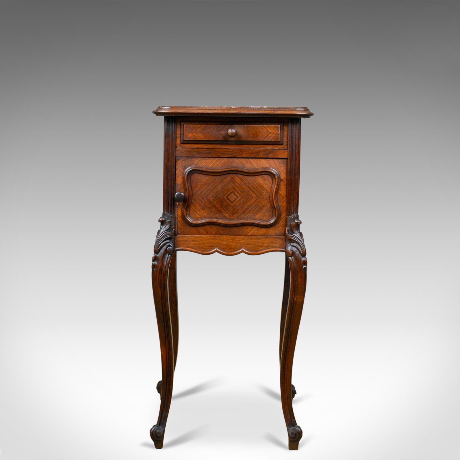 This is a French antique bedside cabinet. A Victorian, walnut, marble top, pot cupboard dating to the late 19th century, circa 1880.

Superior quality, in good proportion and of quality craftsmanship
Attractive tones to the walnut with a mellow