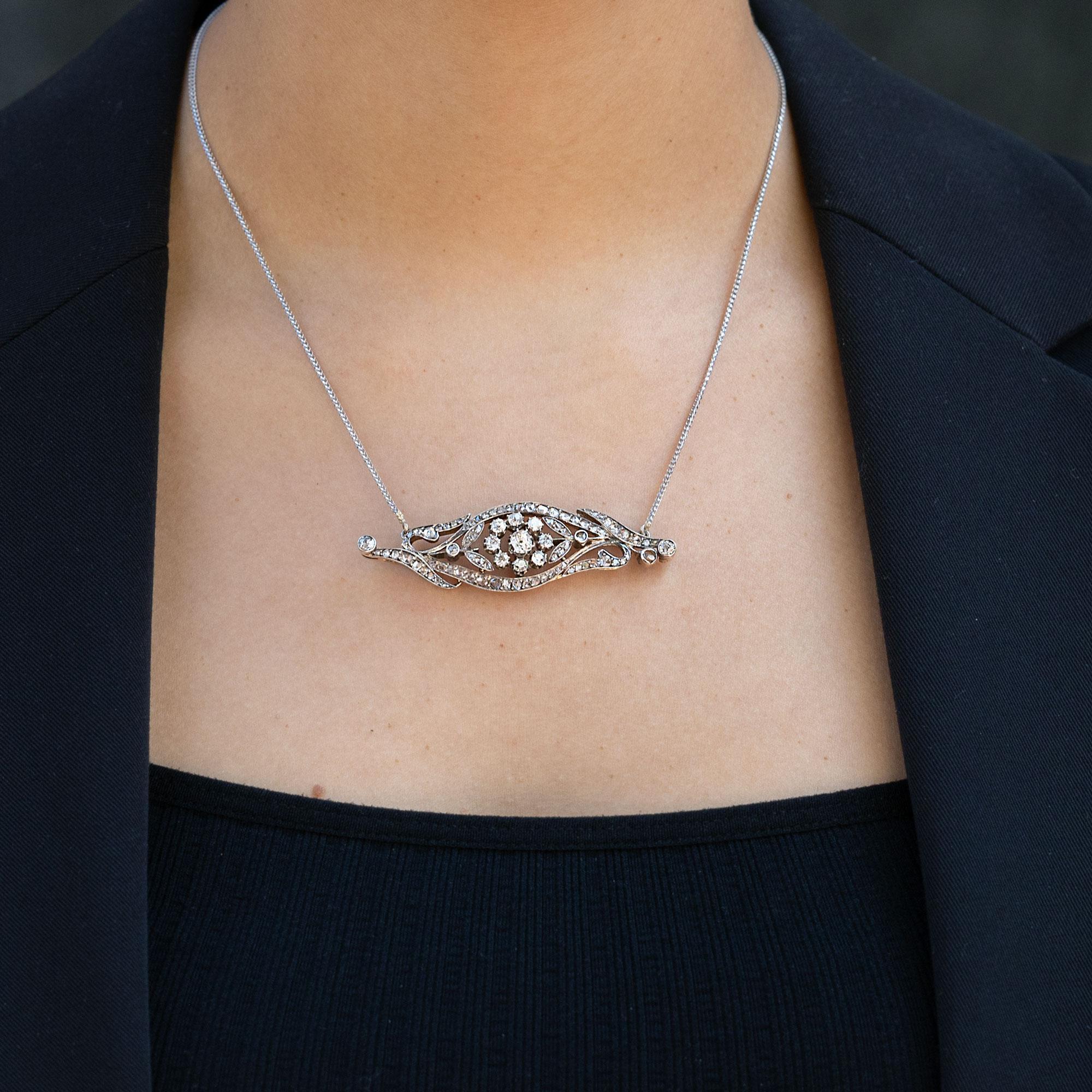 With swirling garlands and fabulous floral motifs, this outstanding French Belle Epoque diamond necklace presents an outstanding statement. Adorned with 2 3/4 carats of sparkling old mine and rose cut diamonds, we revived an antique brooch by