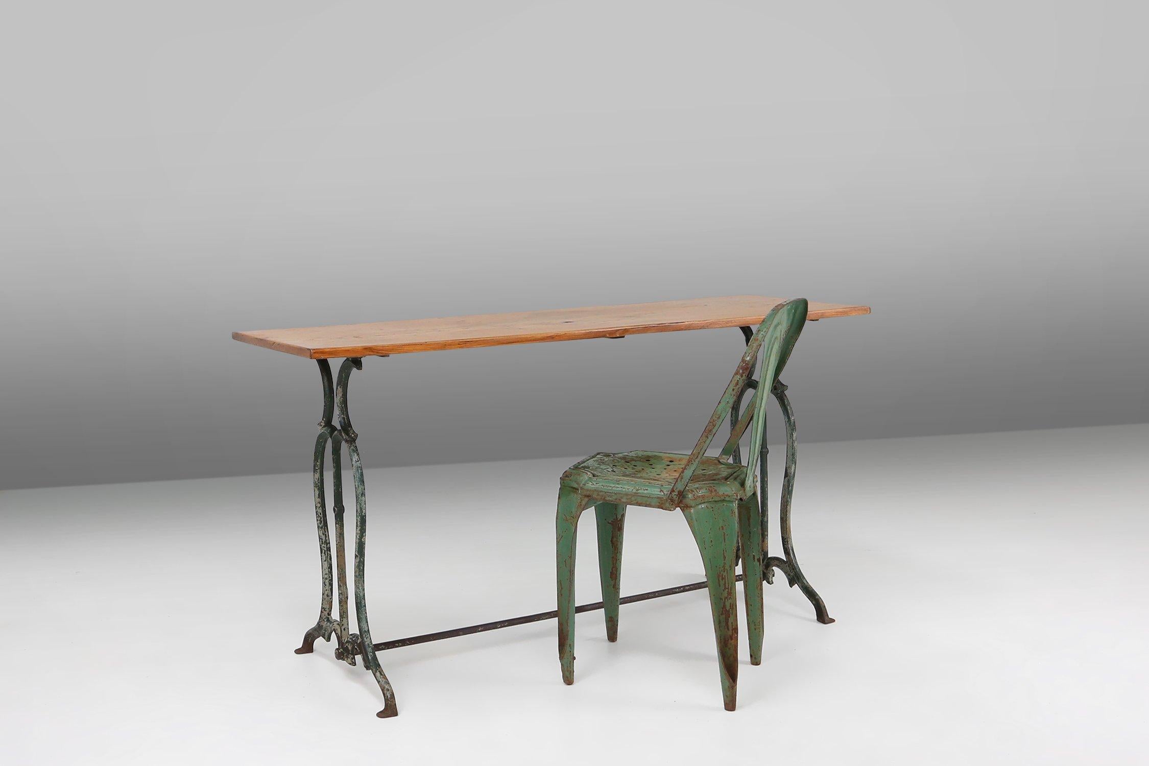 France / 1890 / bistro table / metal and oak / rustic / antique  

A rectangular bistro table with graceful green metal legs and oak top made in France around 1890. This table is professionally restored while its beautiful patina was preserved.  