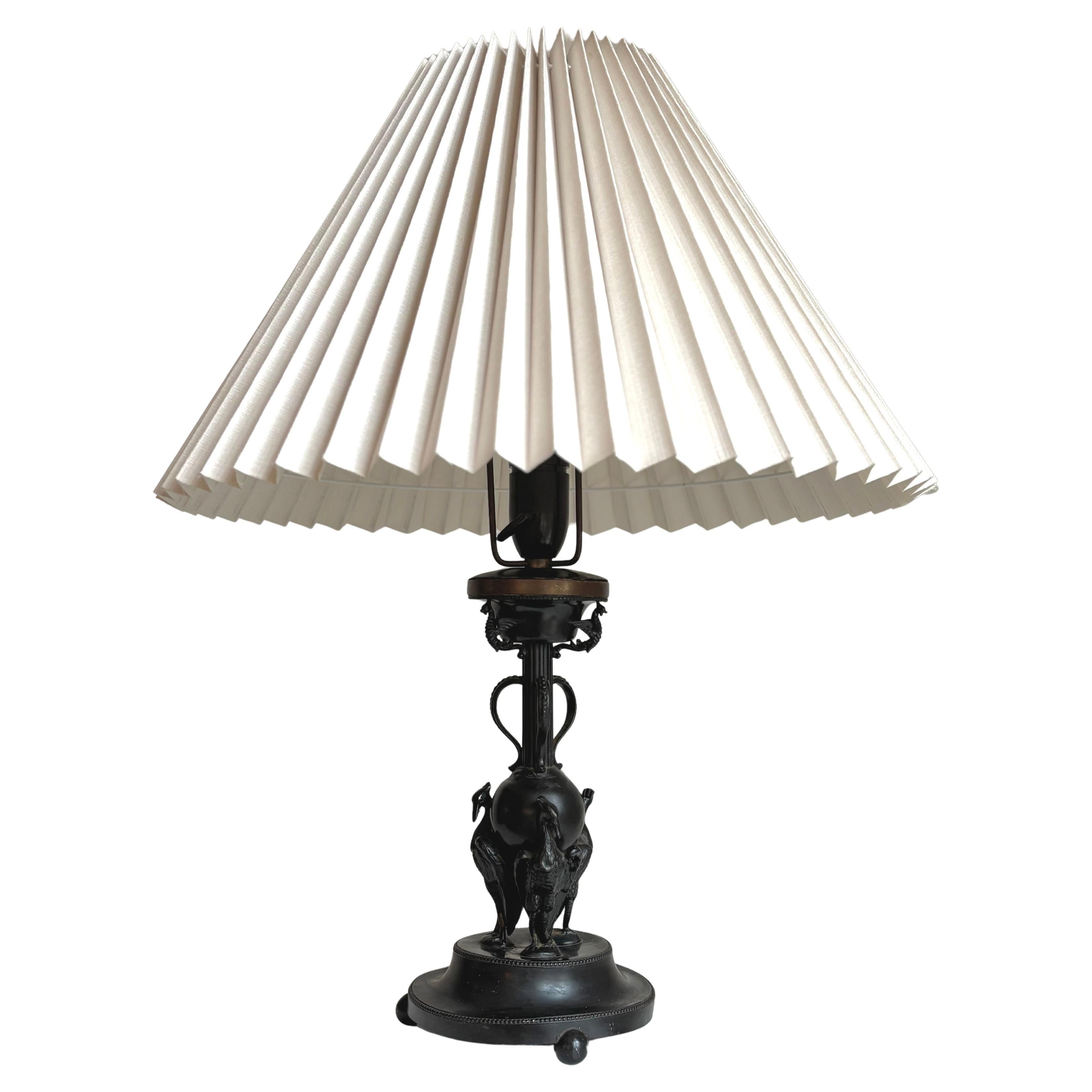 Lámpara de mesa Art Decó francesa antigua de animal negro, circa años 20