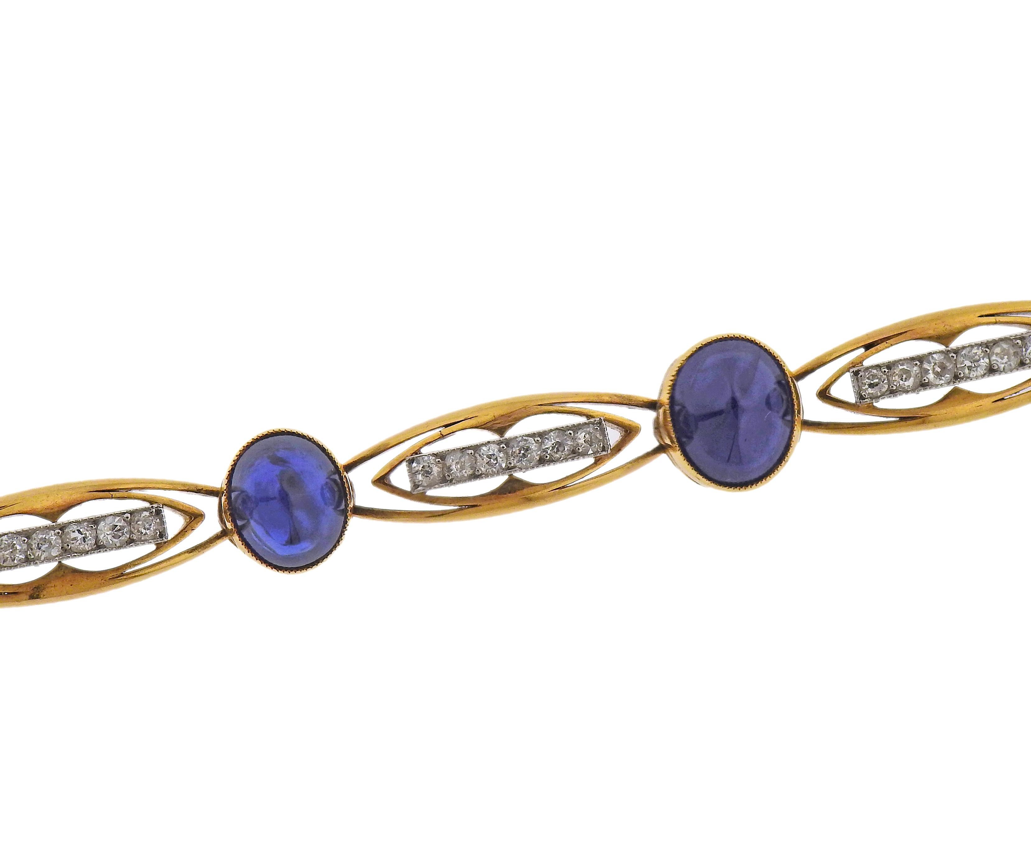 Antique French made 18k gold bracelet, with 7 blue sapphire cabochons (measuring from 5.5 x 5mm to 9 x 7mm - one smaller stone has a tiny nick), with approx. 0.80ctw in old mine cut diamonds. Bracelet is 7