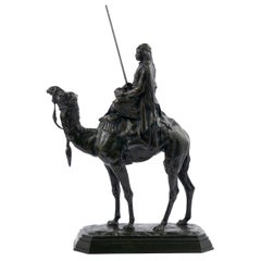 Sculpture française ancienne en bronze "Cavalier arabe sur chameau" par Barye & Delafontaine