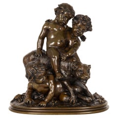 Groupe de sculptures françaises anciennes en bronze Three Putto d
après Claude Michel Clodion