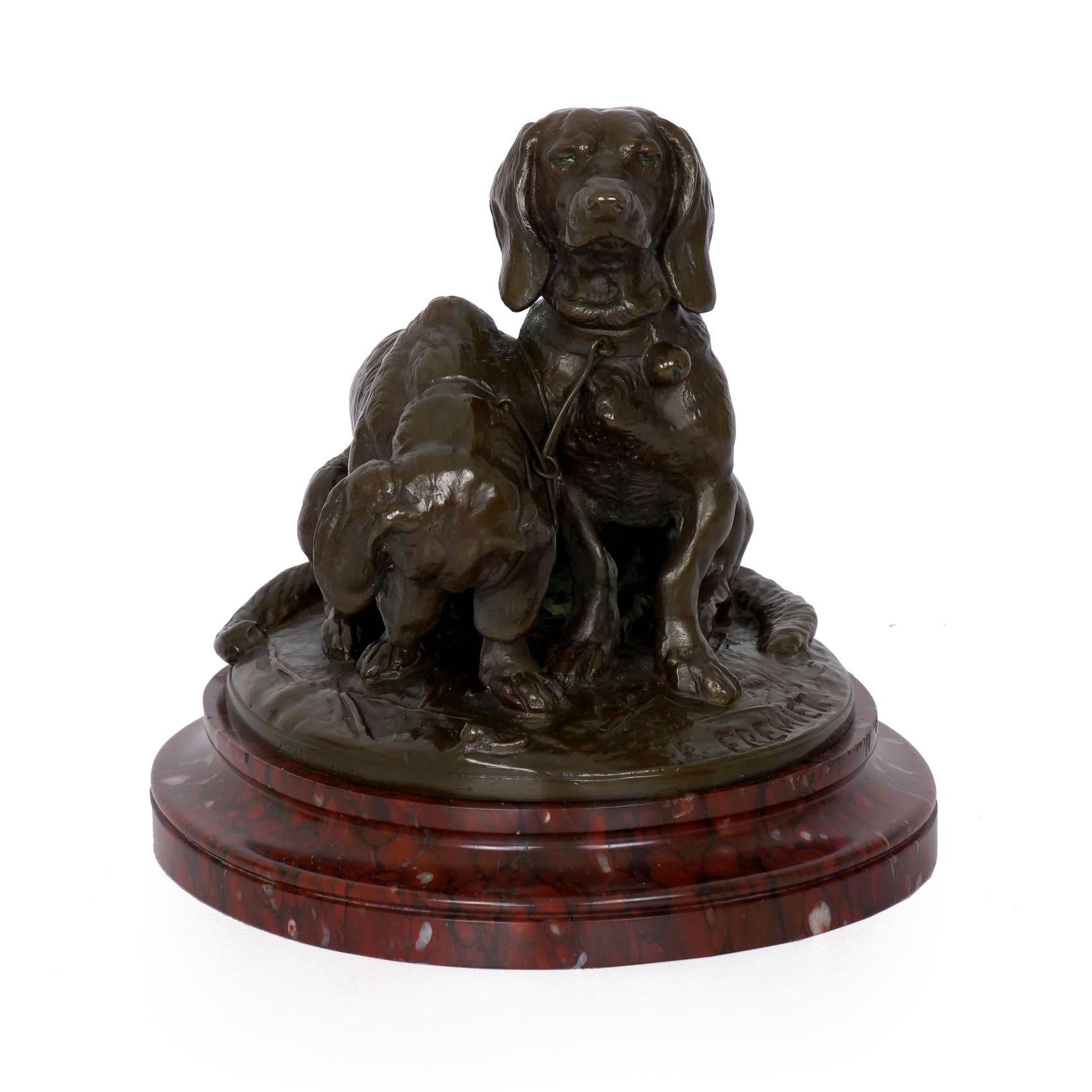 This is a simply gorgeous group sculpted in bronze, the title of which varies somewhat depending on the text you examine - depending on the reference text, it can be noted as pair of seated Dachshunds, Chiens Bassets and Deux Bassets. Though