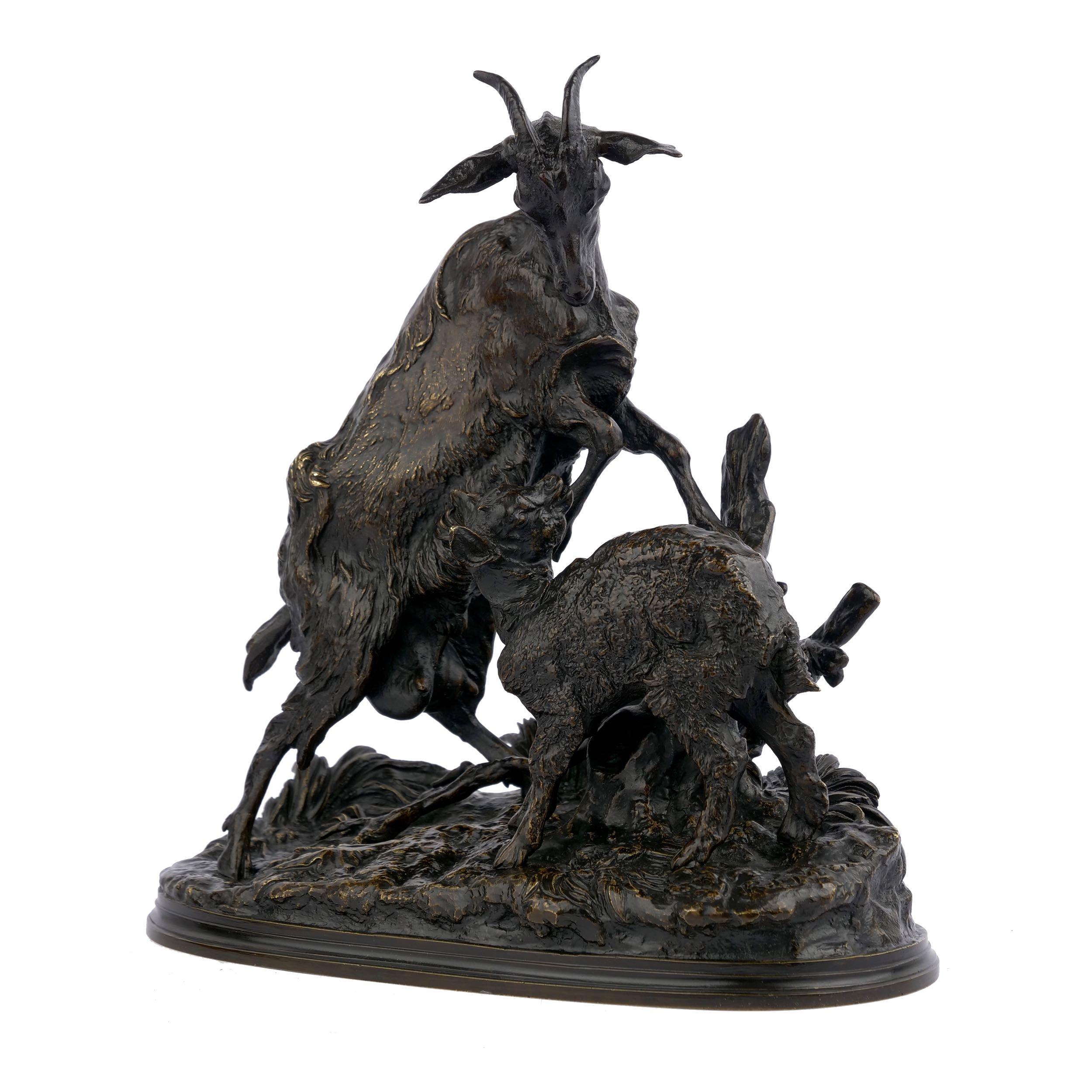 A rare and exceptional model of La Chévre et le Chevreau (The Nanny Goat and her Kid) by Pierre-Jules Mene, it retains an exquisite original patina with complex variations from greens to blacks, warmer hues of brown and golden brassy highlights. The