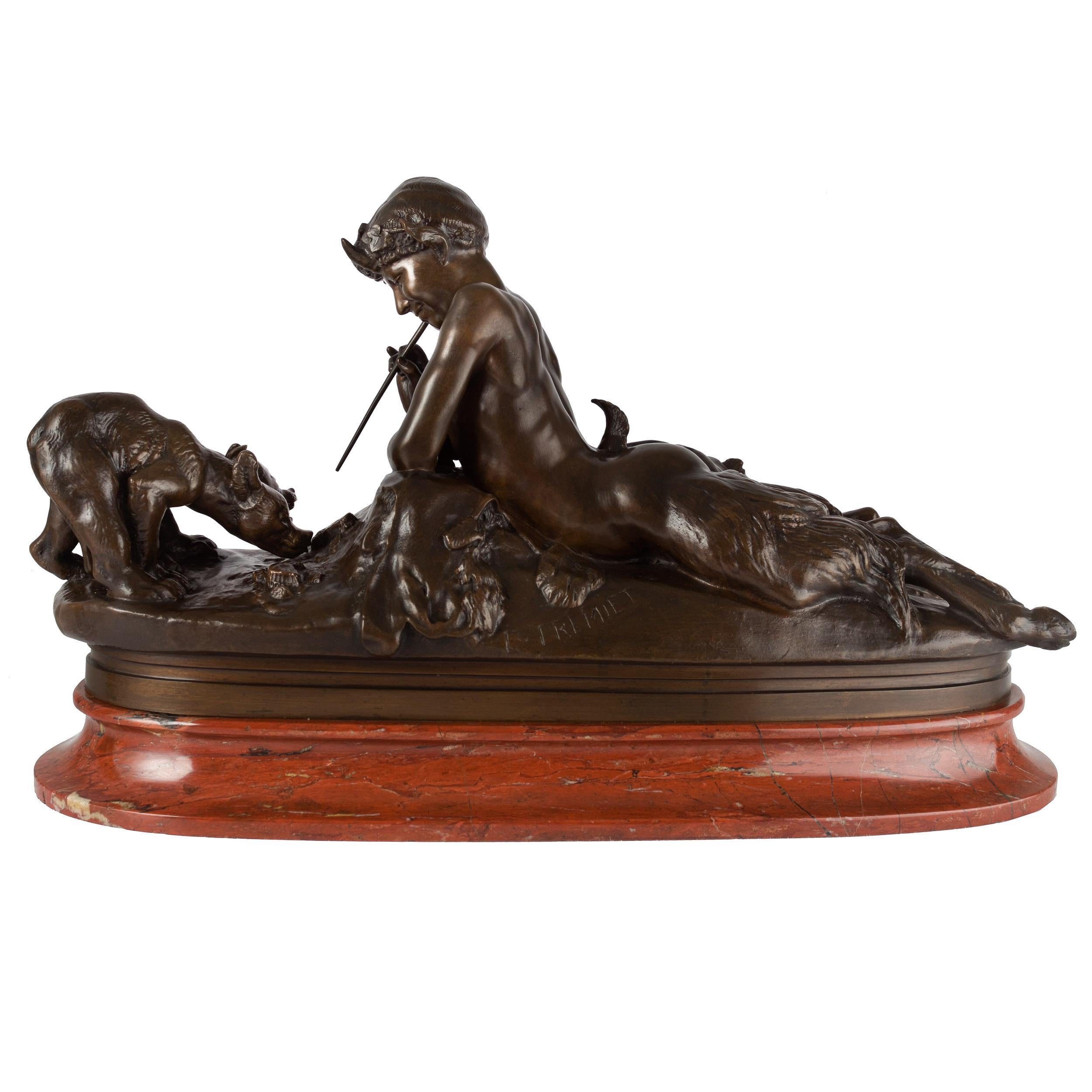 A very fine model of Pan et Oursons after the monumental original marble sculpture by Emmanuel Fremiet, it depicts the young satyr Pan resting over a naturalistic base at total ease with the nature surrounding him; in his hand he grasps a thin stick