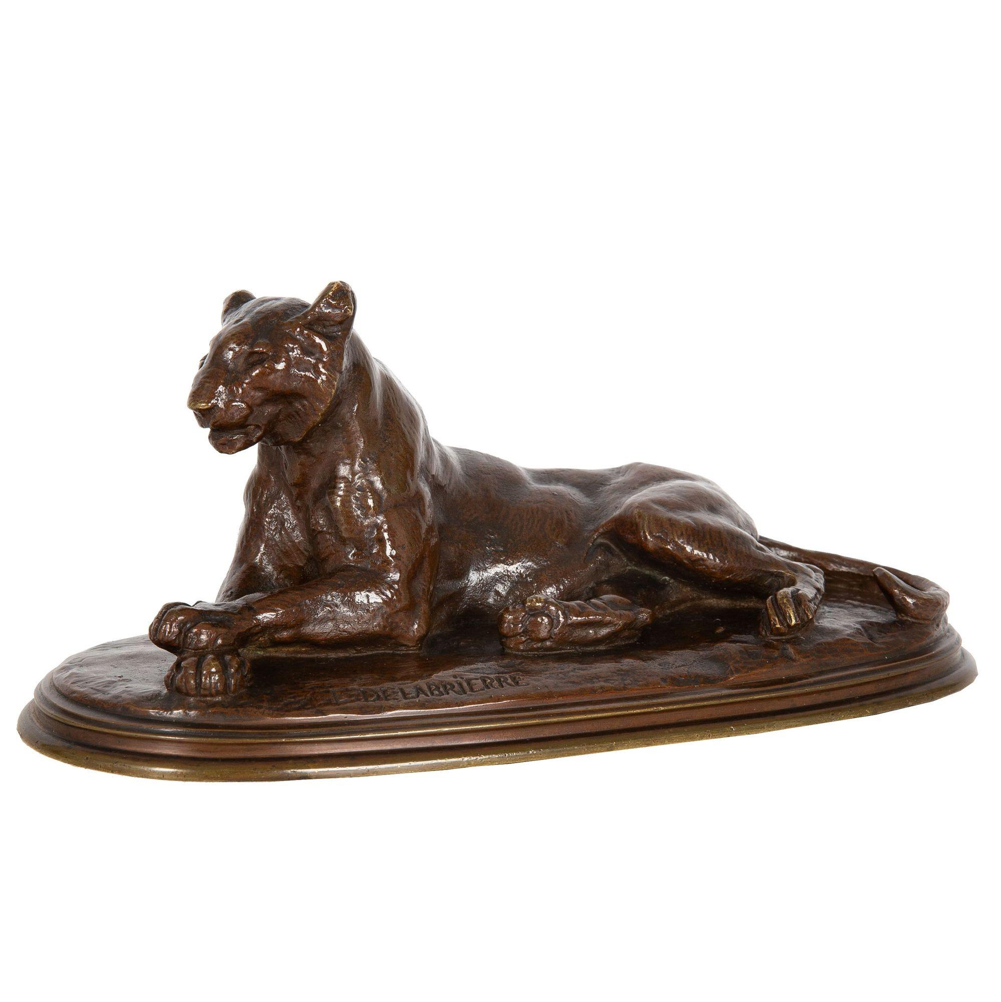 PAUL EDOUARD DELABRIERRE
Français, 1829-1912

La tigresse au repos

Bronze patiné rouge-brun coulé au sable  Signé en bas 