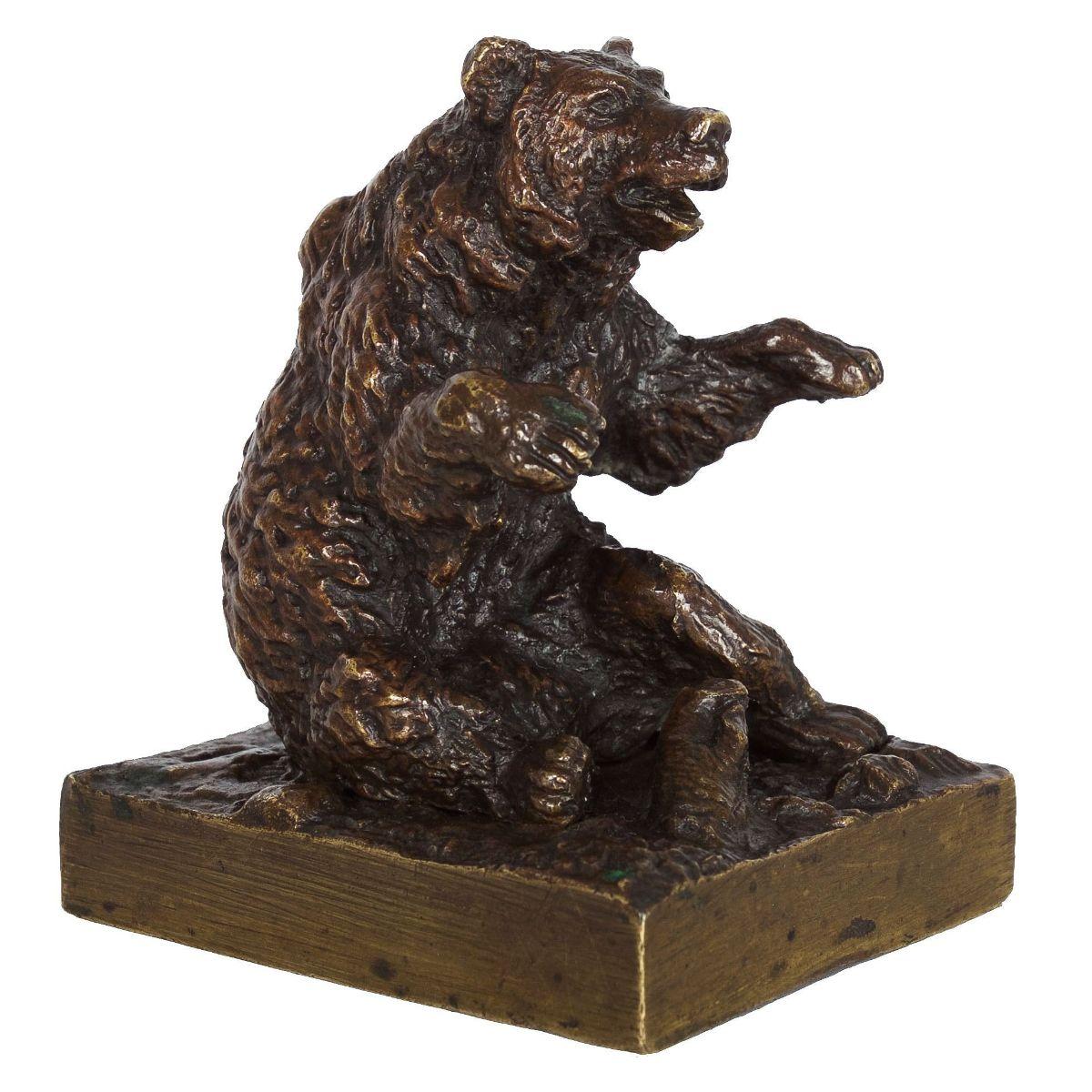 An unusual and very small cabinet bronze by Fratin of a seated bear with its paws raised in a playful manner, the bear's features avoid the humorous anthropomorphism of his popular bear caricatures while still lending a highly expressive face. The