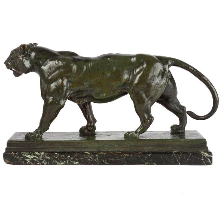 Barye's ability to merge our romantic idealization of nature with a colder reality of nature's predator is beautifully represented in this striding cat. Originally conceived in 1841, Tigre Qui Marche (Walking Tiger) is a picture of poise and