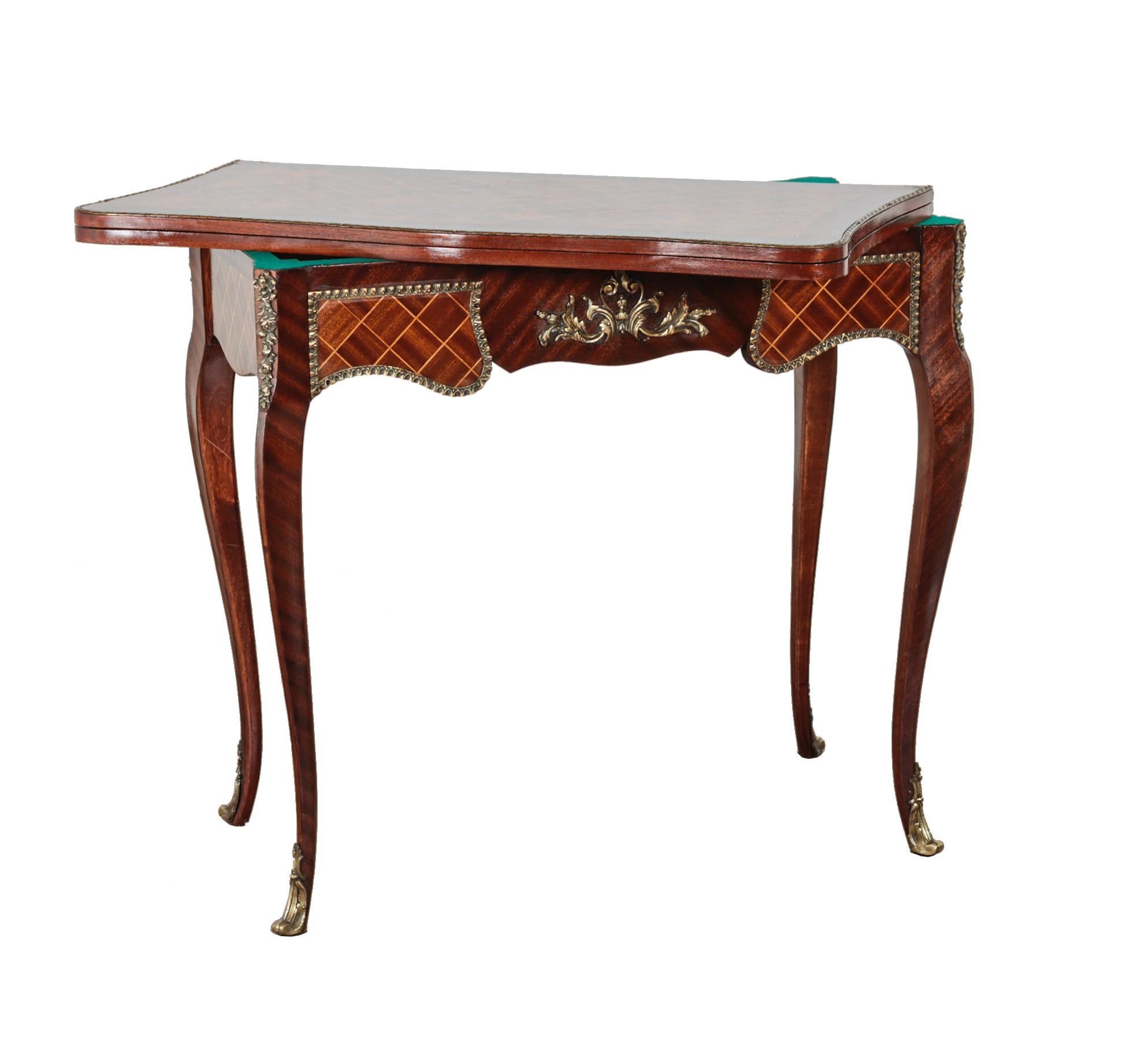 - Gorgeous antique French card table we date to circa 1890 and in the French Empire style
- Features intricate parquetry work to the front
- Ormolu fixtures are well cast and with greta patina
- Top swivels out and opens to reveal green beize