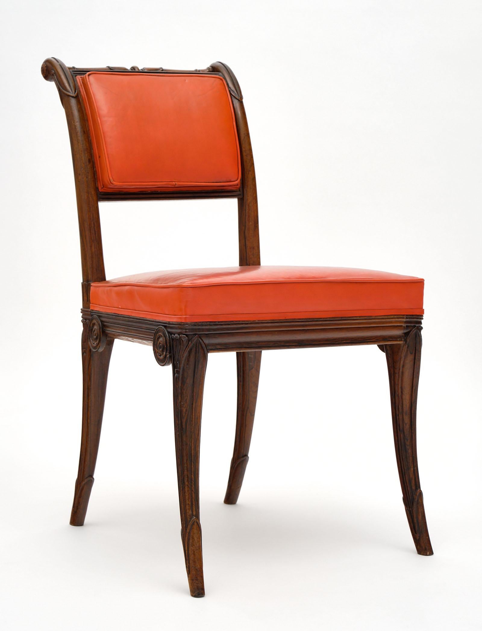 Set of five Charles X style antique dining chairs made of solid, hand carved rosewood. These French chairs feature the original red-orange upholstery.
