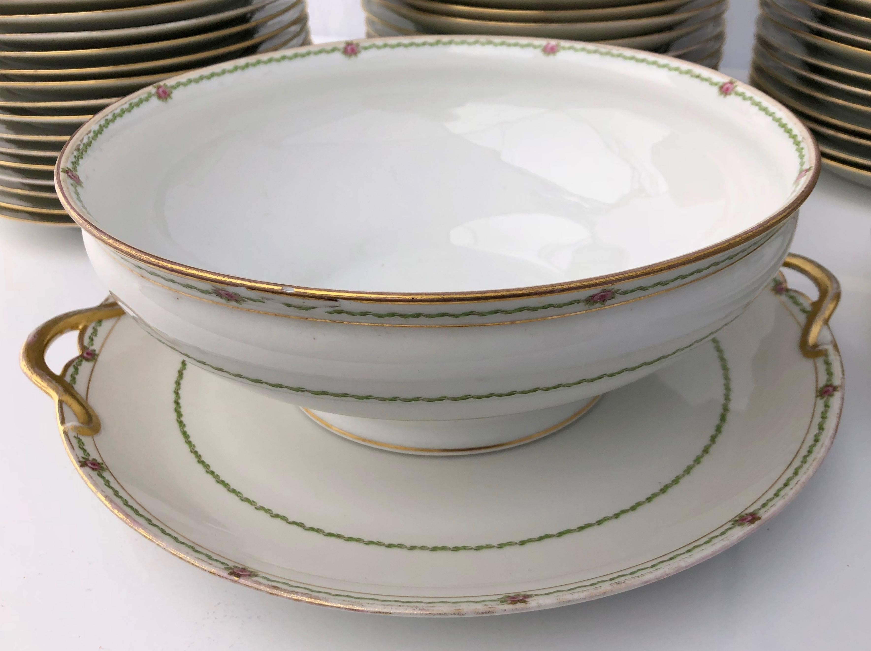 antique white china with gold trim