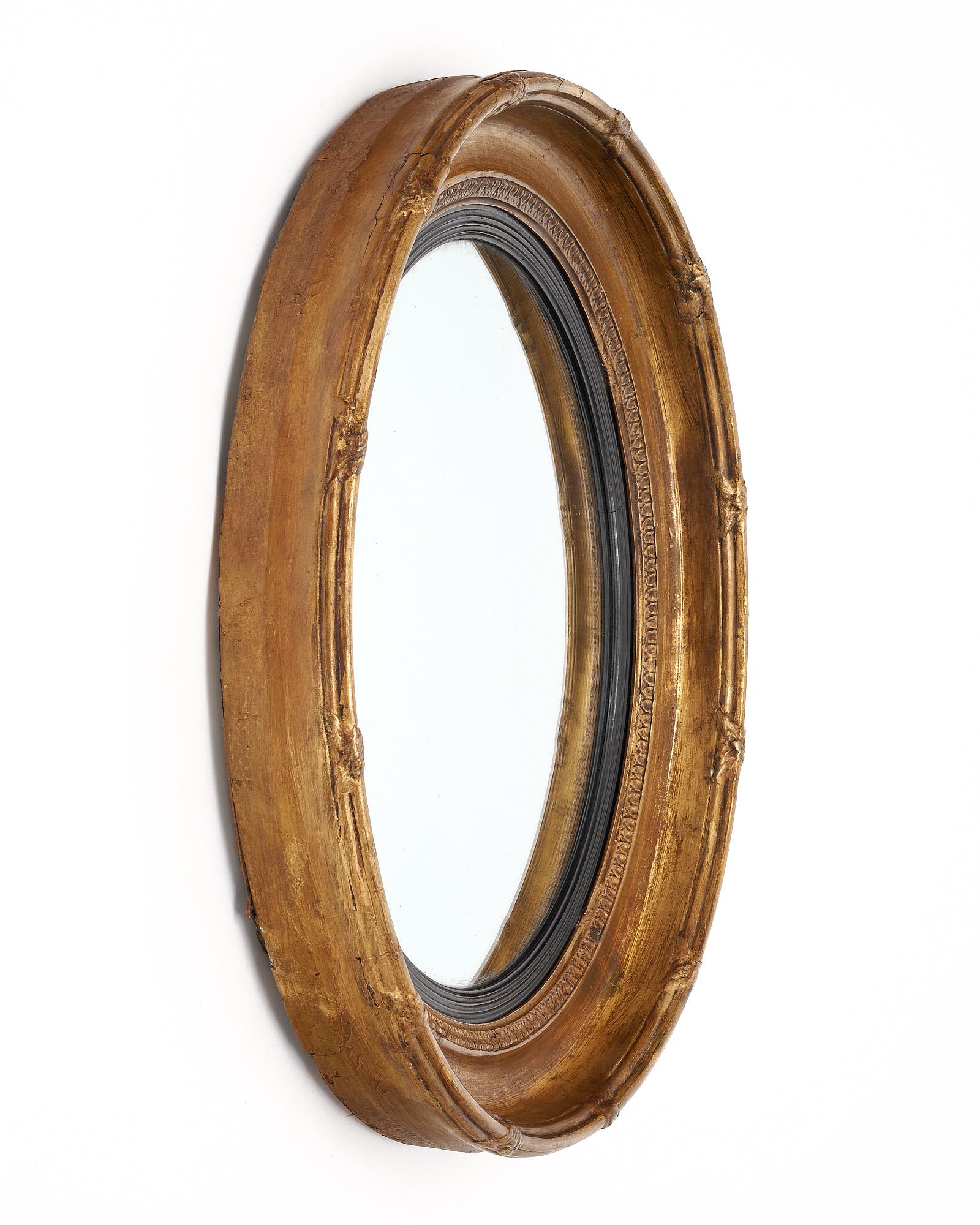 French antique circular convex mirror, all original, with a wood frame finished with 23 carat gold leafing.

