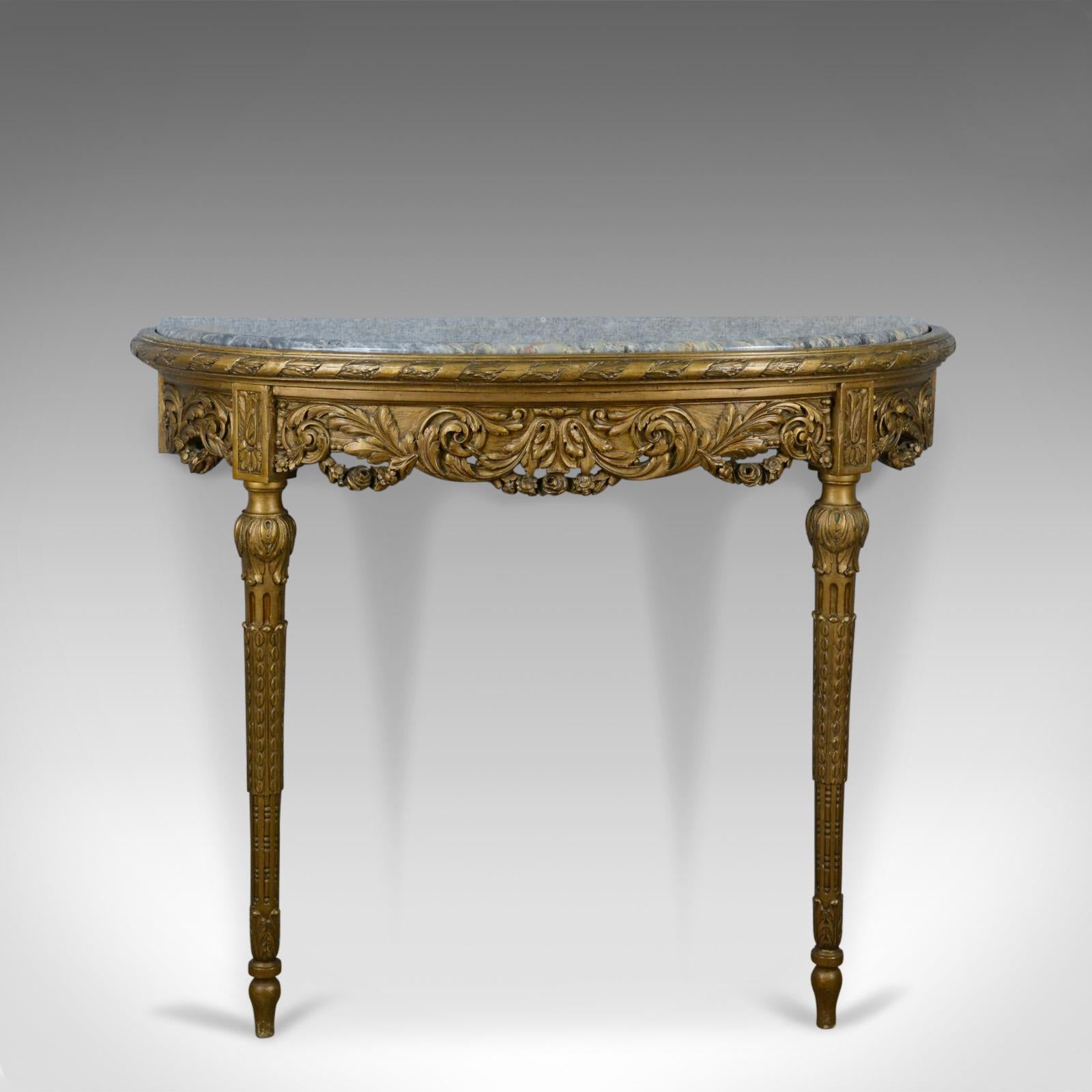 This is a French antique console table, a giltwood and marble, classical revival, pier table dating to circa 1900.

Desirable color and patina to the giltwood frame
Of quality craftsmanship and select materials
Robust and sturdy display