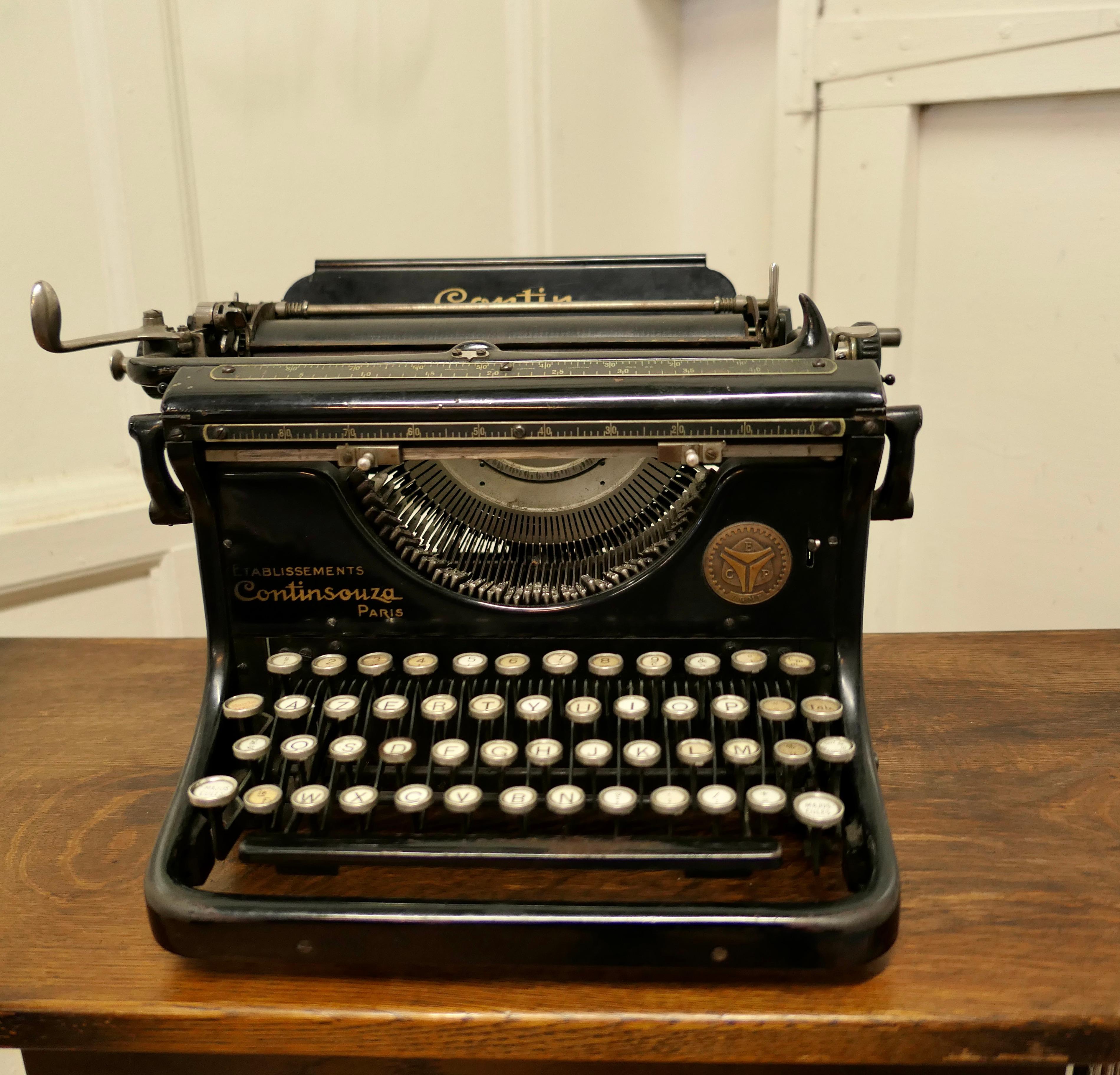French antique Contin Typewriter from the 1940s 

This is a Contin Continsouza Paris, Modèle A n 24 - 1940s, the typewriter is good tidy condition, as a show piece, it all seems to work but if you intend to use it, it will require a service,