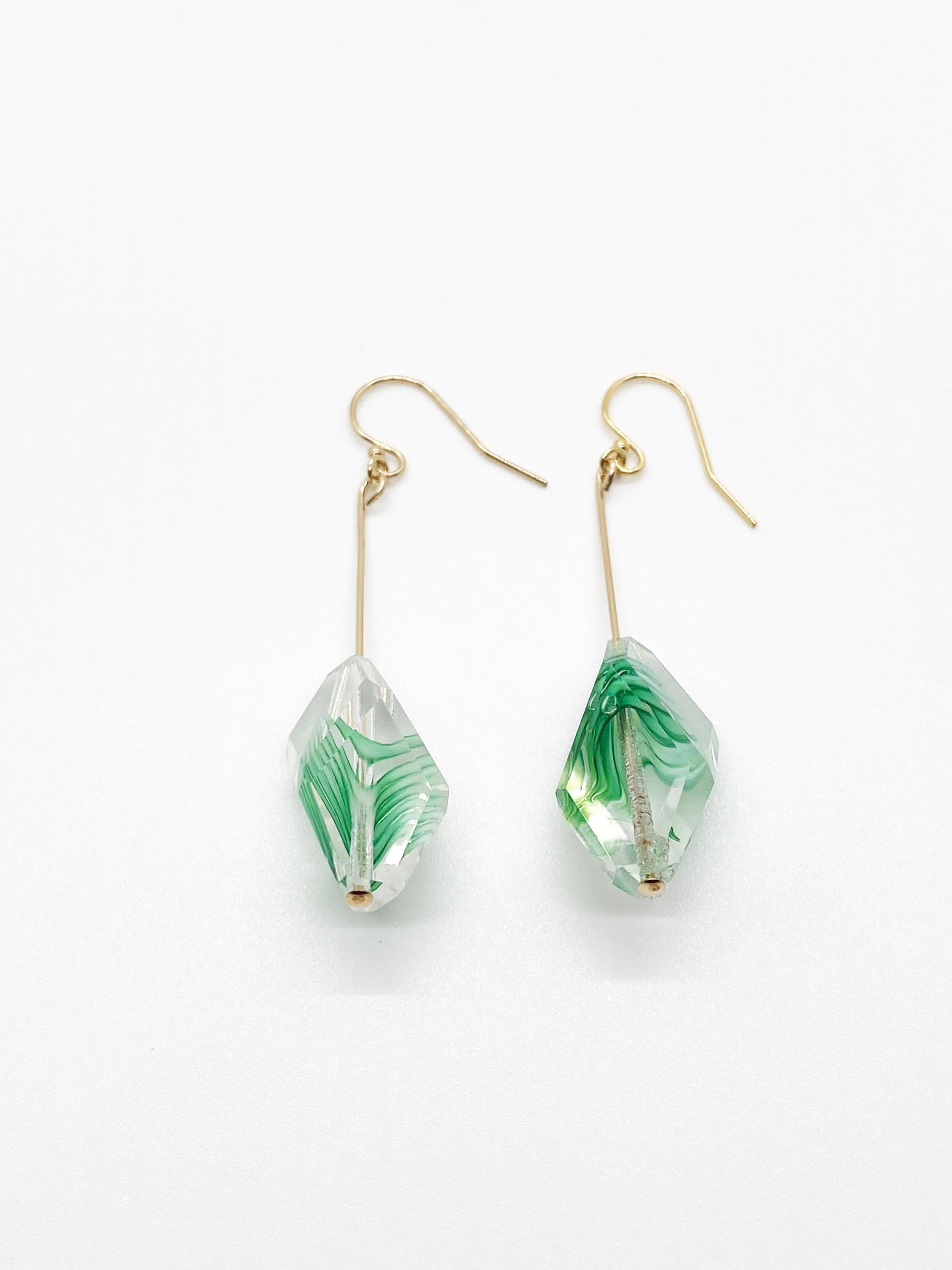 Rare and breathtakingly beautiful. French antique crystal glass beads, Circa 1910s simply dangles on 14K gold filled ear wires. The only pair that is available in green. 

The crystals measures 24mm x 12mm. 