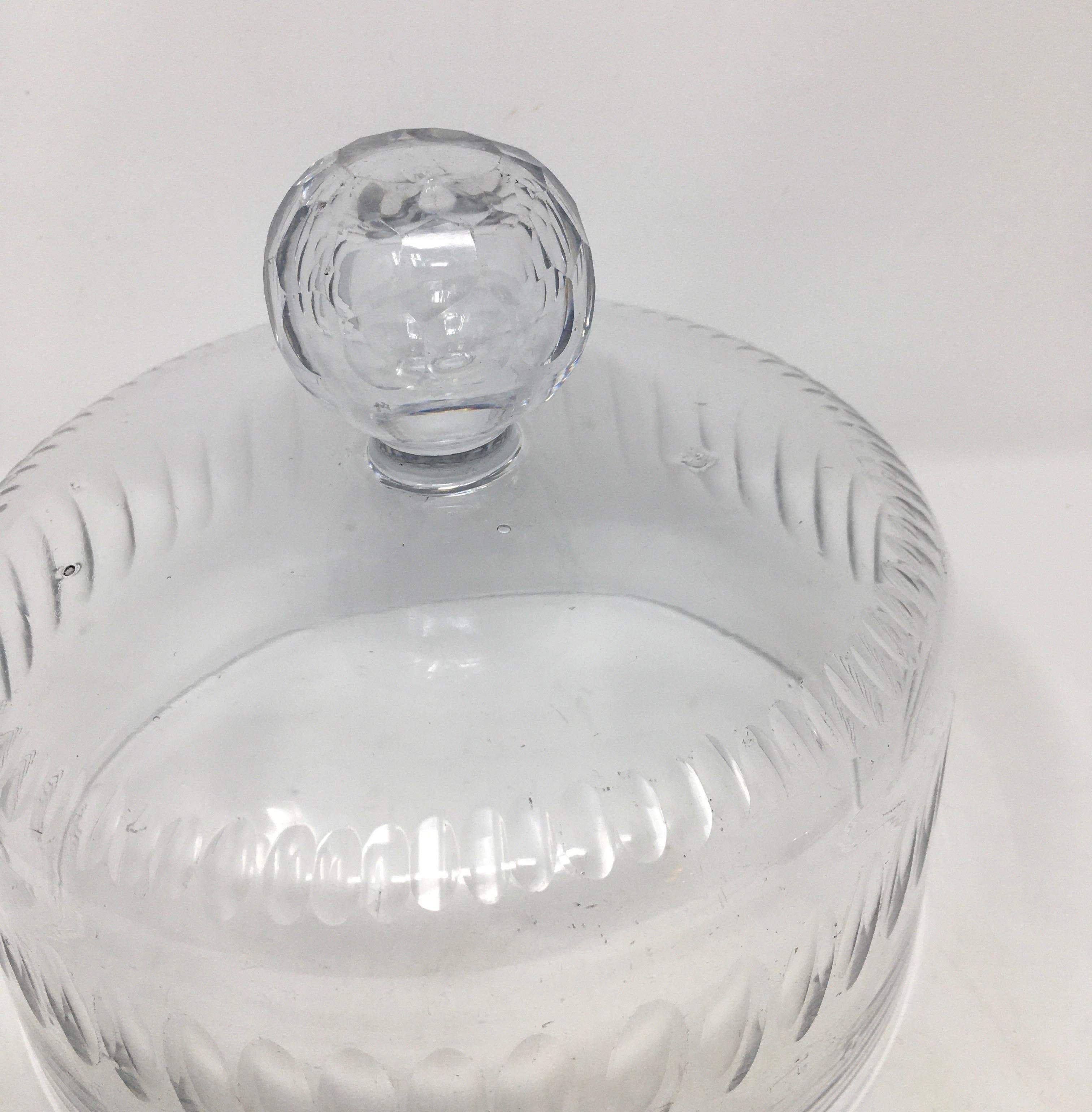 French antique Patisserie cut glass dome cloche with a solid glass knob handle. This cloche with beautiful cut glass detailing, was used in French Cheese Shop's to cover and display cheeses.
  