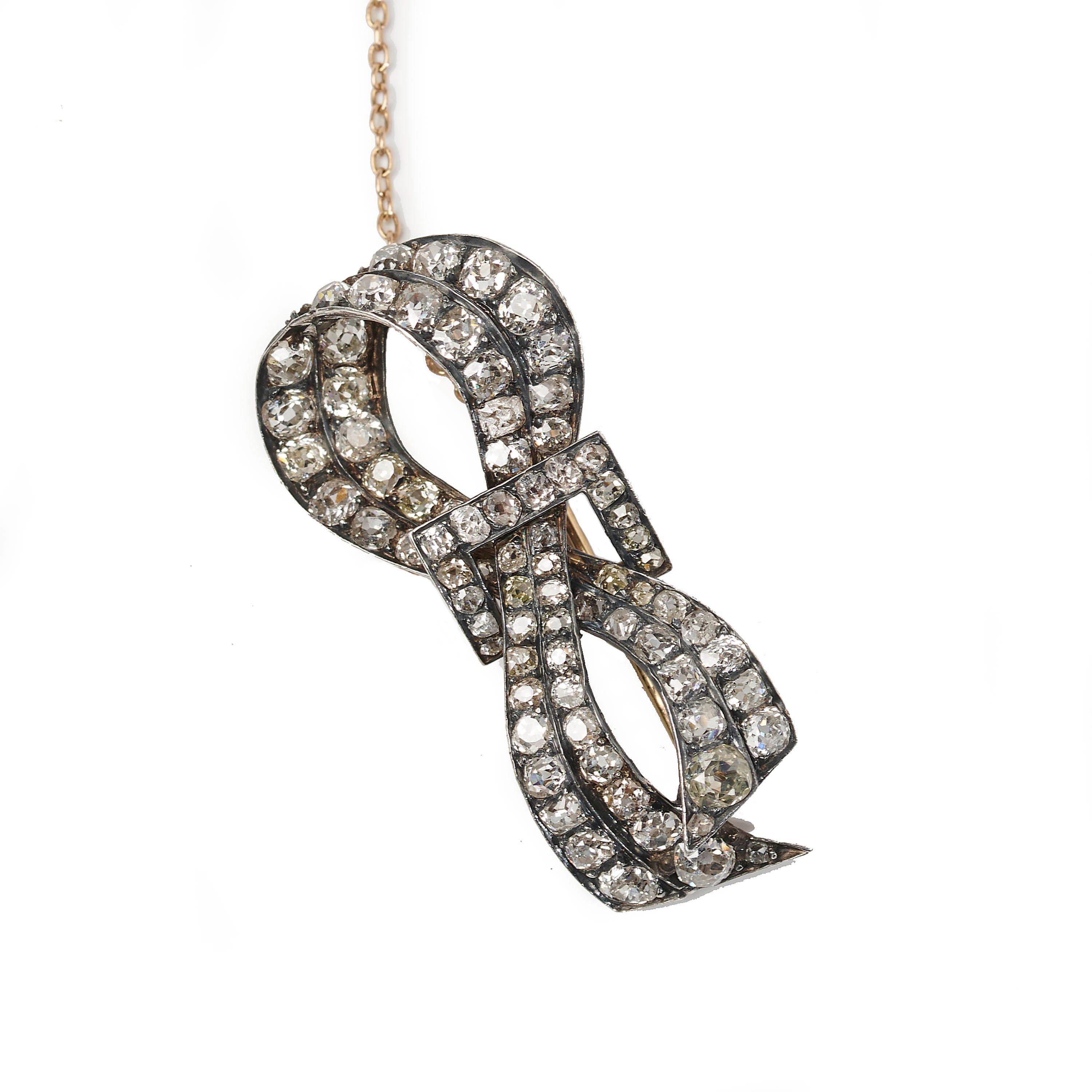 Victorian French Antique Diamond and Silver Upon Gold Bow Brooch, circa 1880 For Sale
