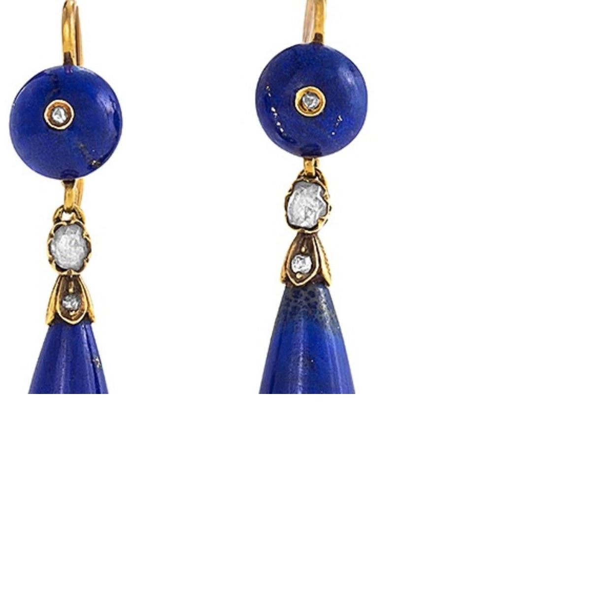 A pair of French Antique 18 karat gold earrings with diamonds and lapis lazuli. The articulated earrings have 6 rose-cut diamonds with an approximate total weight of .24 carat, and round and lozenge shape lapis lazuli stones. French wires later. 