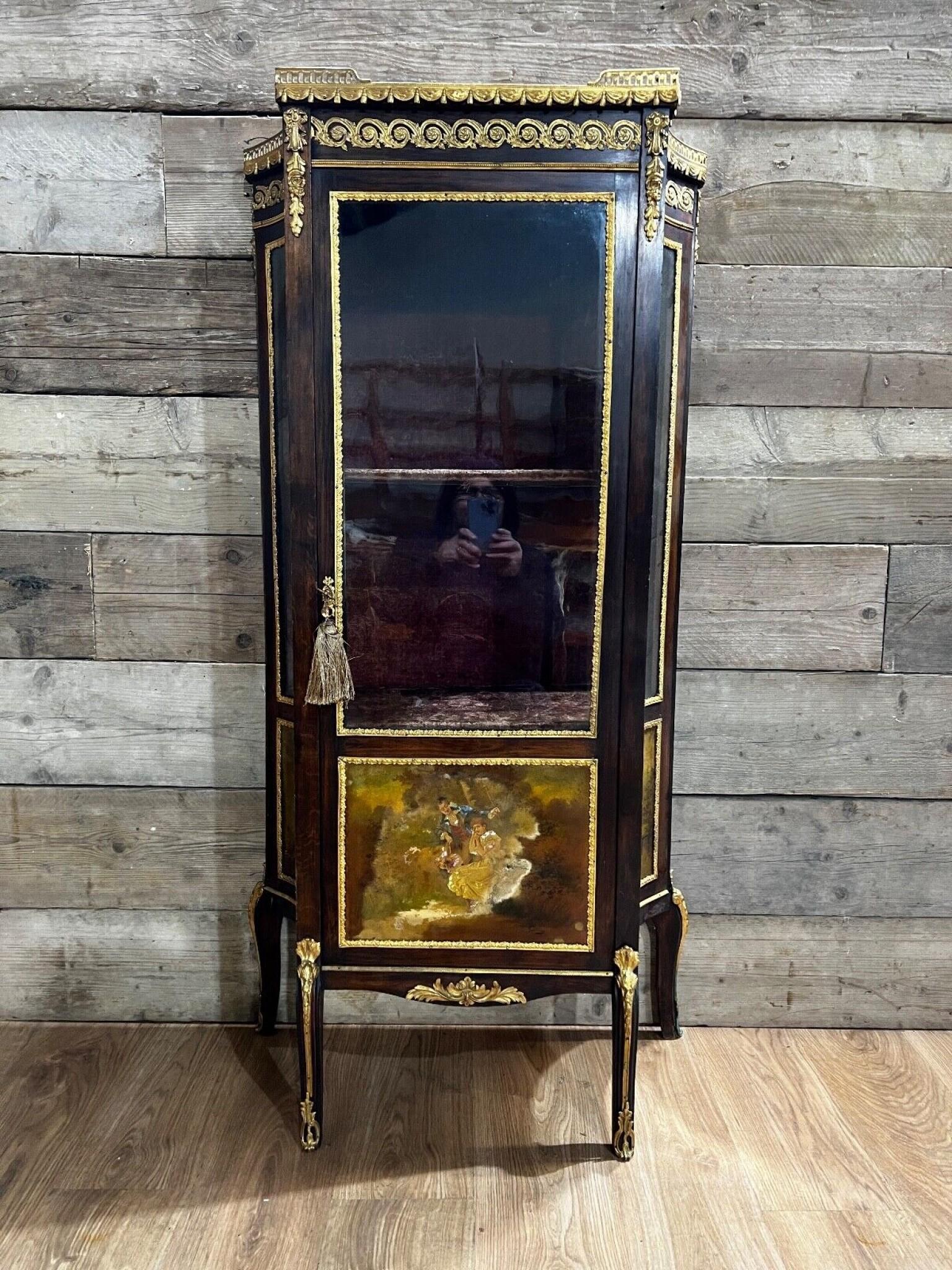 Gorgeous French vitrine with painted panels in the Vernis Martin manner
Circa 1880 on this gorgeous display cabinet with original ormolu mounts
Bought from a dealer on Marche Biron at the Paris antiques market
Hand painted designs feature Romantic