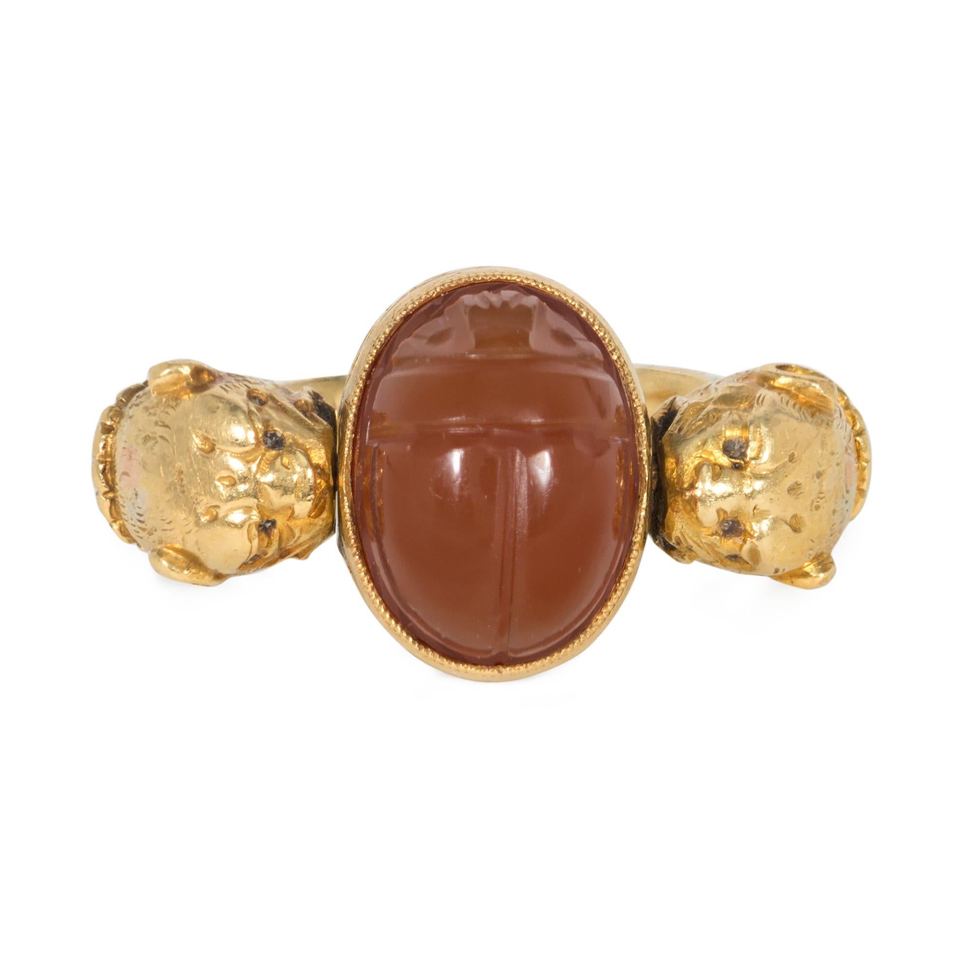 Oval Cut French Antique Egyptian Revival Gold and Carnelian Scarab Ring with Lion Heads For Sale