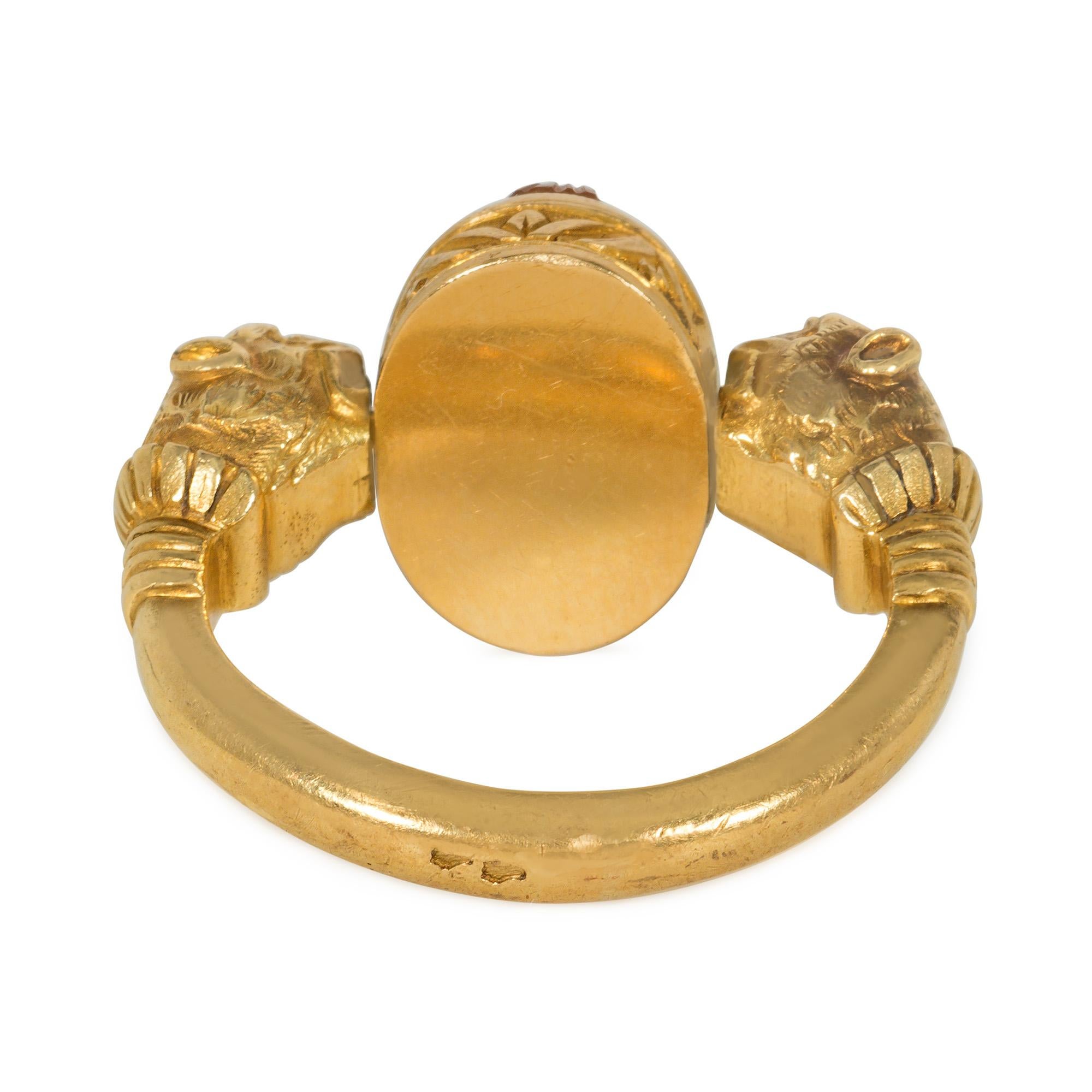 Women's or Men's French Antique Egyptian Revival Gold and Carnelian Scarab Ring with Lion Heads For Sale