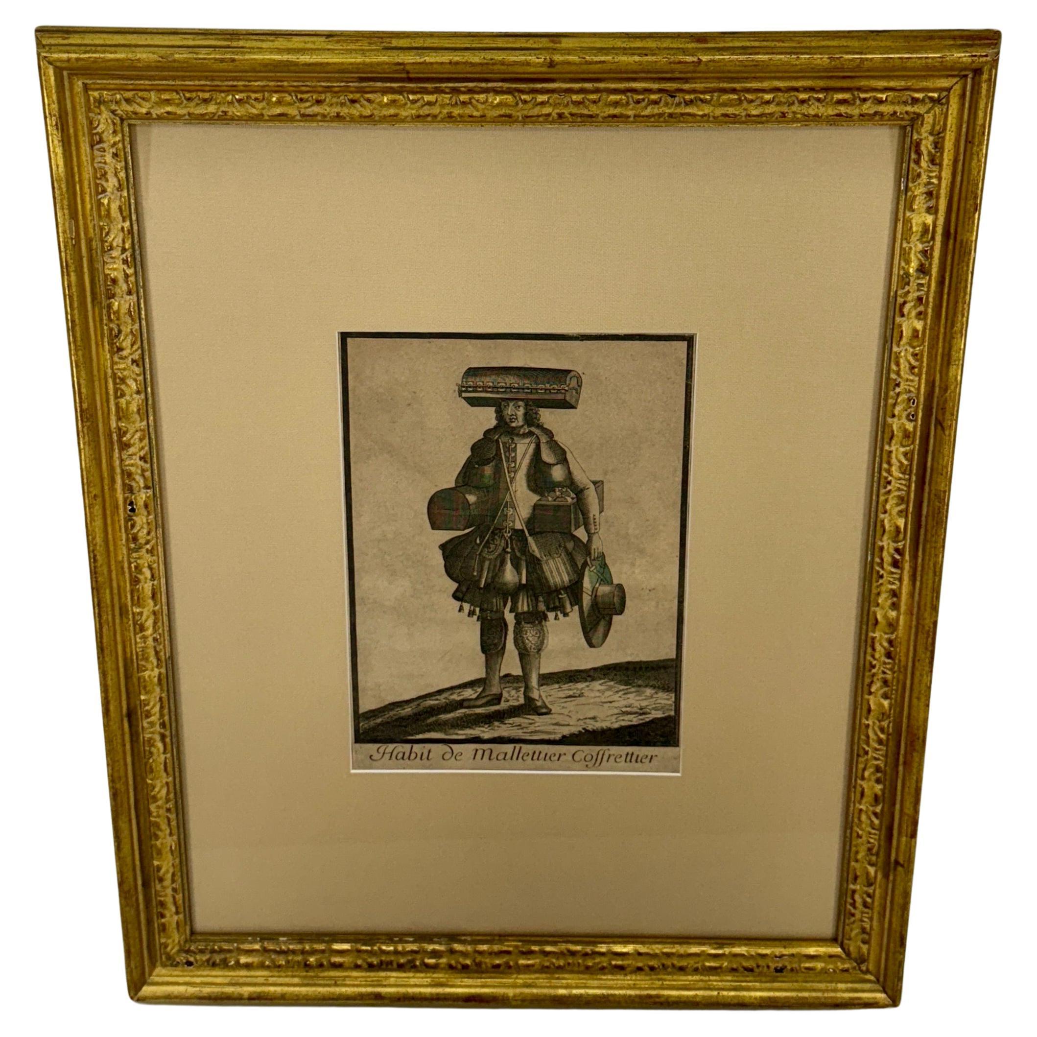 This classic vintage print titled Habit de Mallettier Coffrettier (Outfit of a Trunk Maker) has been matted and framed in an antique gold frame. The French artist is Unknown. This artwork would make a wonderful piece to add to gallery wall