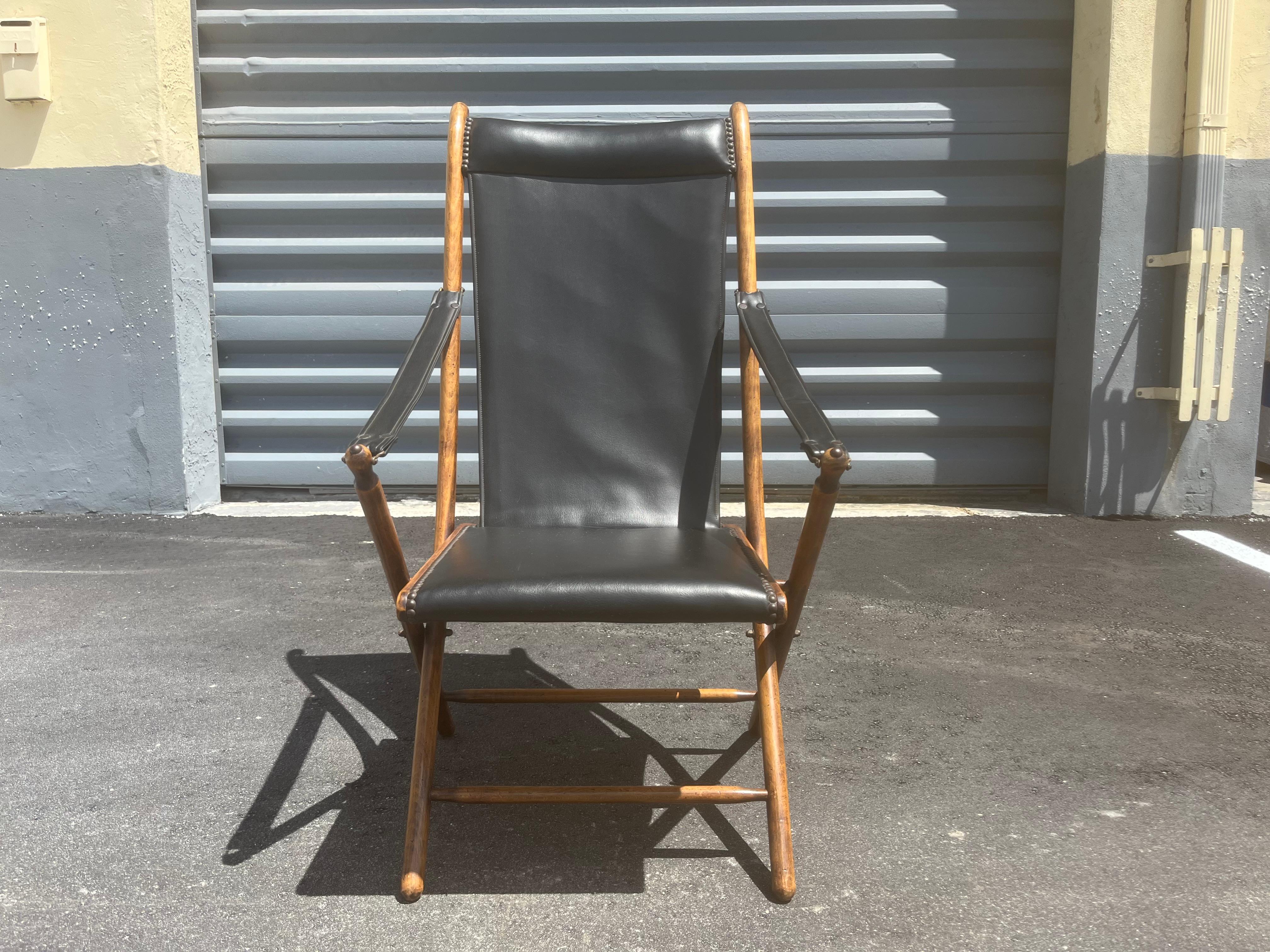 Wood and Black Faux Leather Antique Folding Chair, Made in France. Brass Hardware. Ready for a new home.