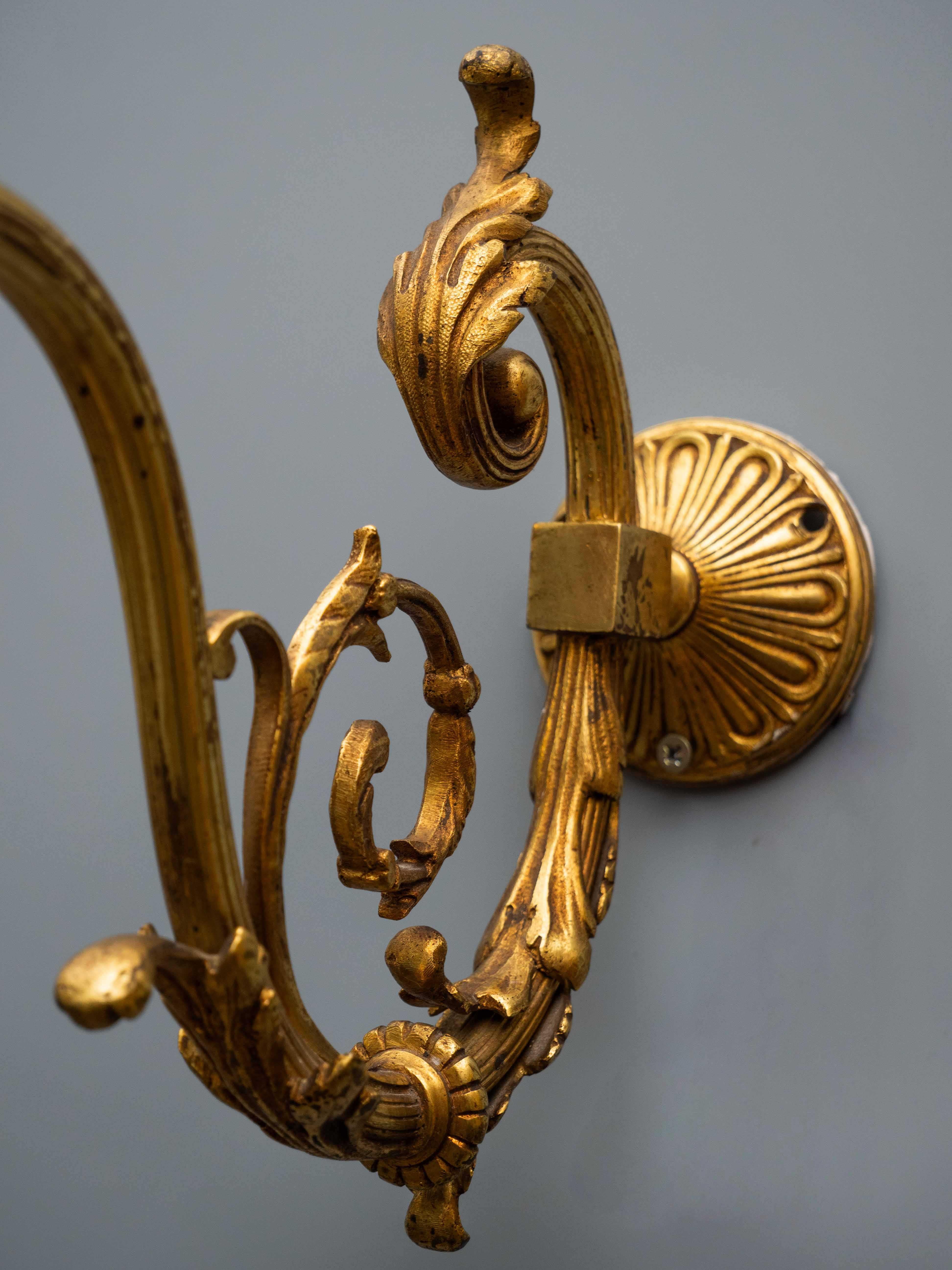 Bronze French antique gilded wall lamps pair For Sale