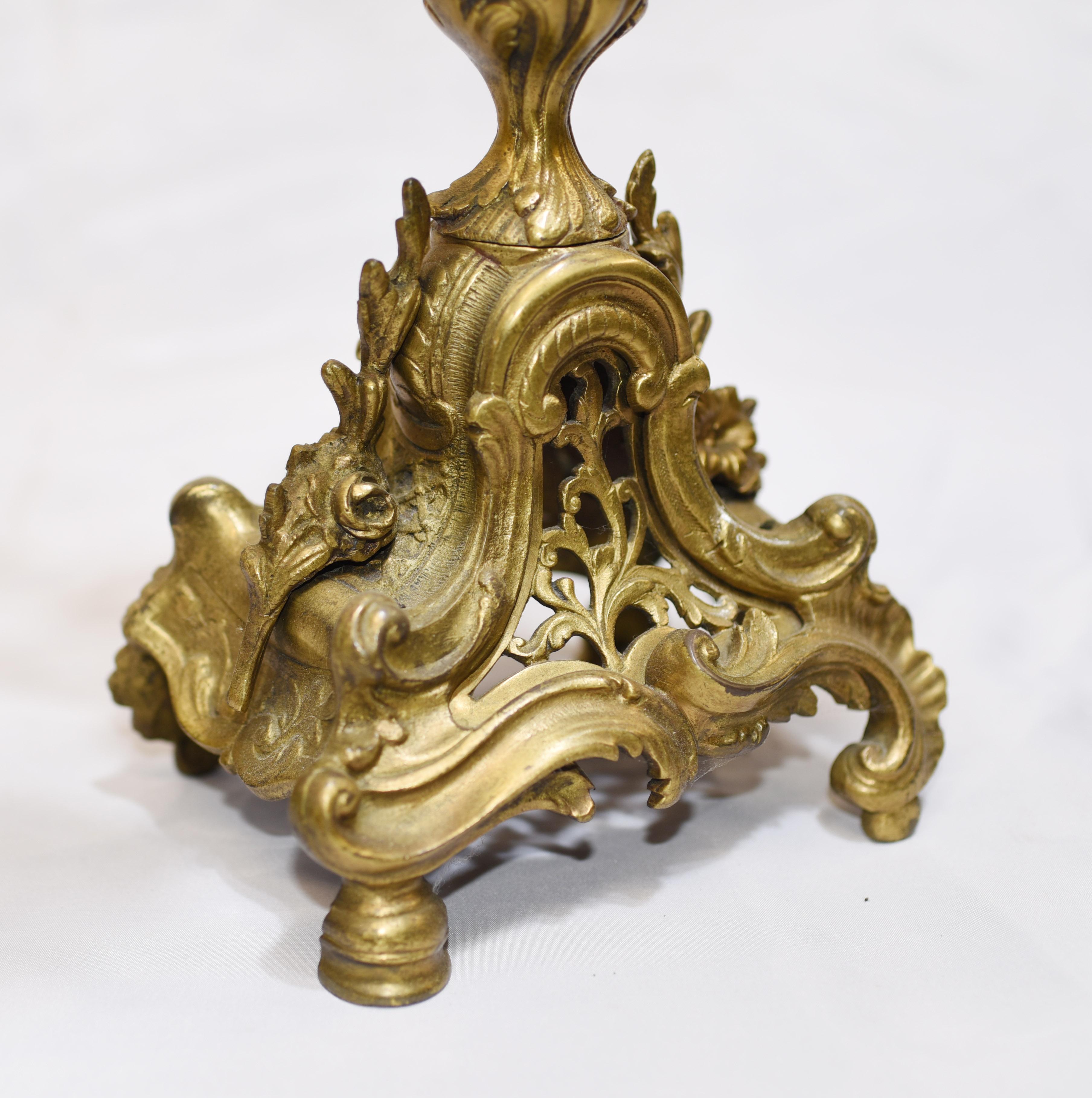 - Gorgeous antique French bronze clock set 
- Gilt clock is surmounted by gorgeous cherub and flanked by candelabras
- Great patina to gilt 
- Purchased from a dealer on Marche Biron at Paris antiques markets
- Viewings available by