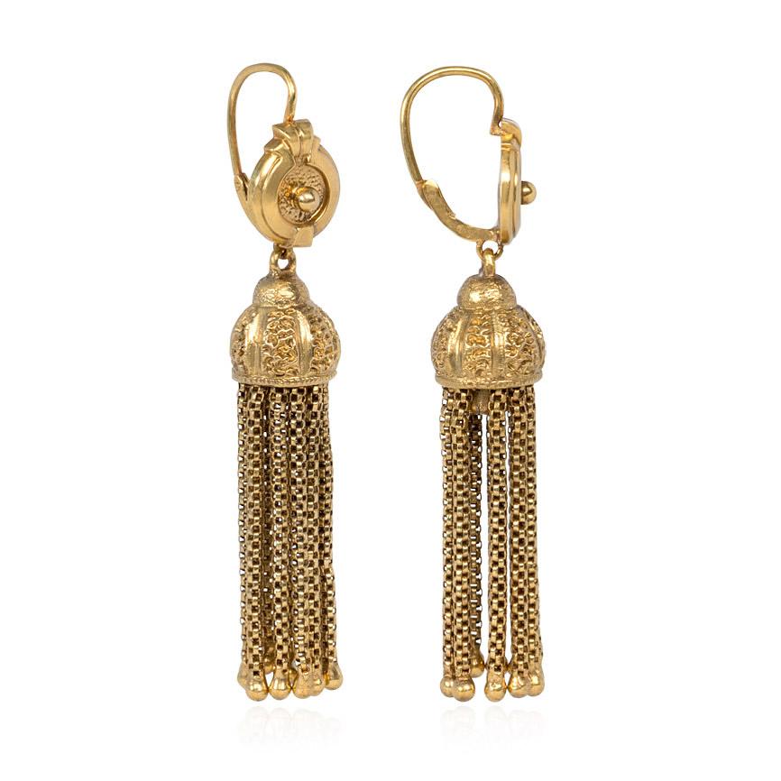 A pair of antique gold fringed tassel earrings suspended from circular surmounts, in 18k.  France