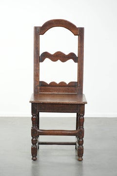 French antique Lorraine chair made of oak from the 18th century