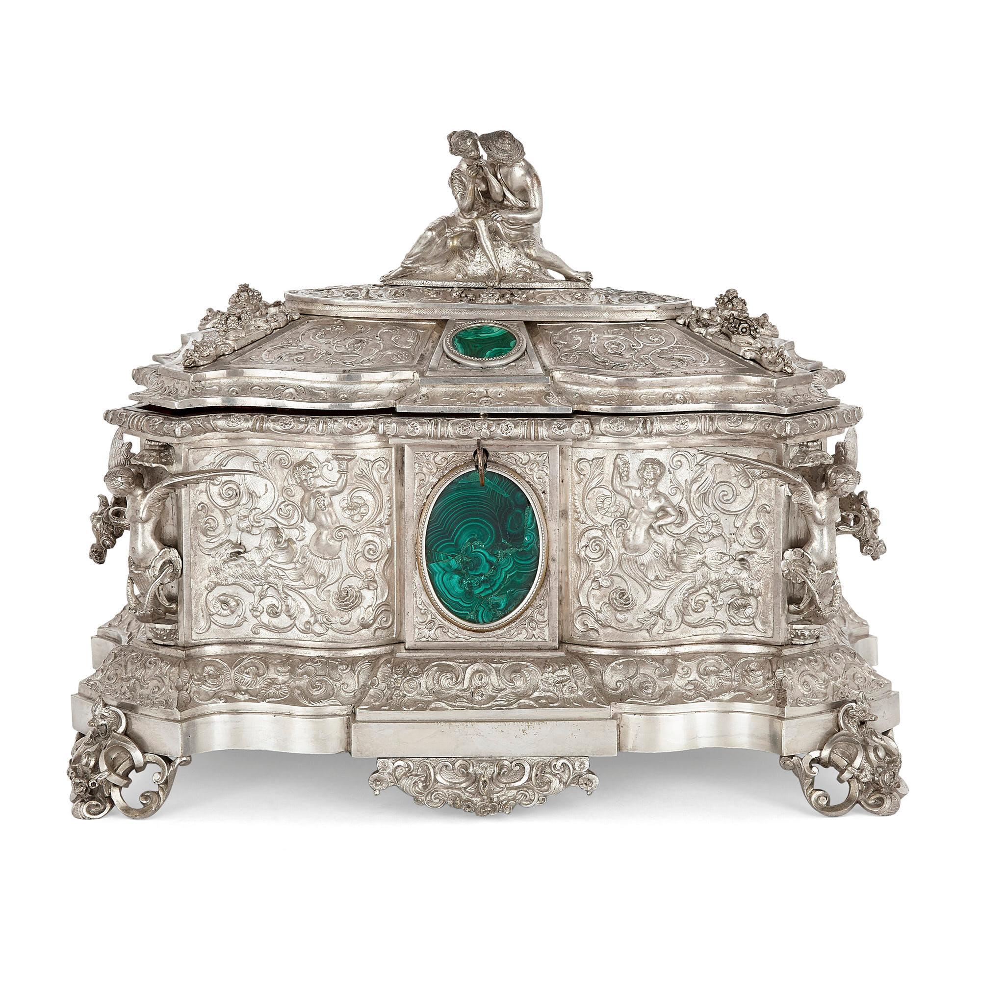 French antique malachite and silvered bronze casket
French, 19th century
Measures: Height 25cm, width 33cm, depth 20cm

This superb jewellery casket is crafted from deftly wrought silvered bronze. The undulating surface of the casket is moulded