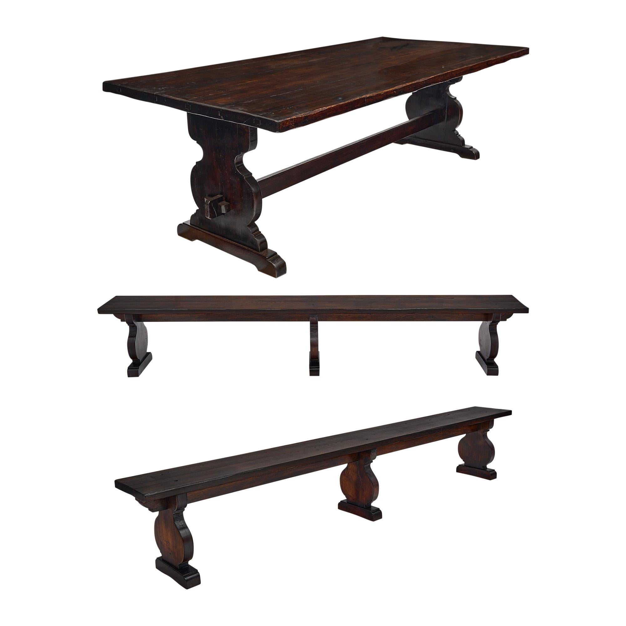 Monastery table, French, mad of hand carved oak that has been stained and waxed. This piece is made with an antique peg construction and ‘lyra” pedestals and feet. There are two benches with dimensions below.

BENCHES
L102.5”
D 11.5”
H 17.5”.
