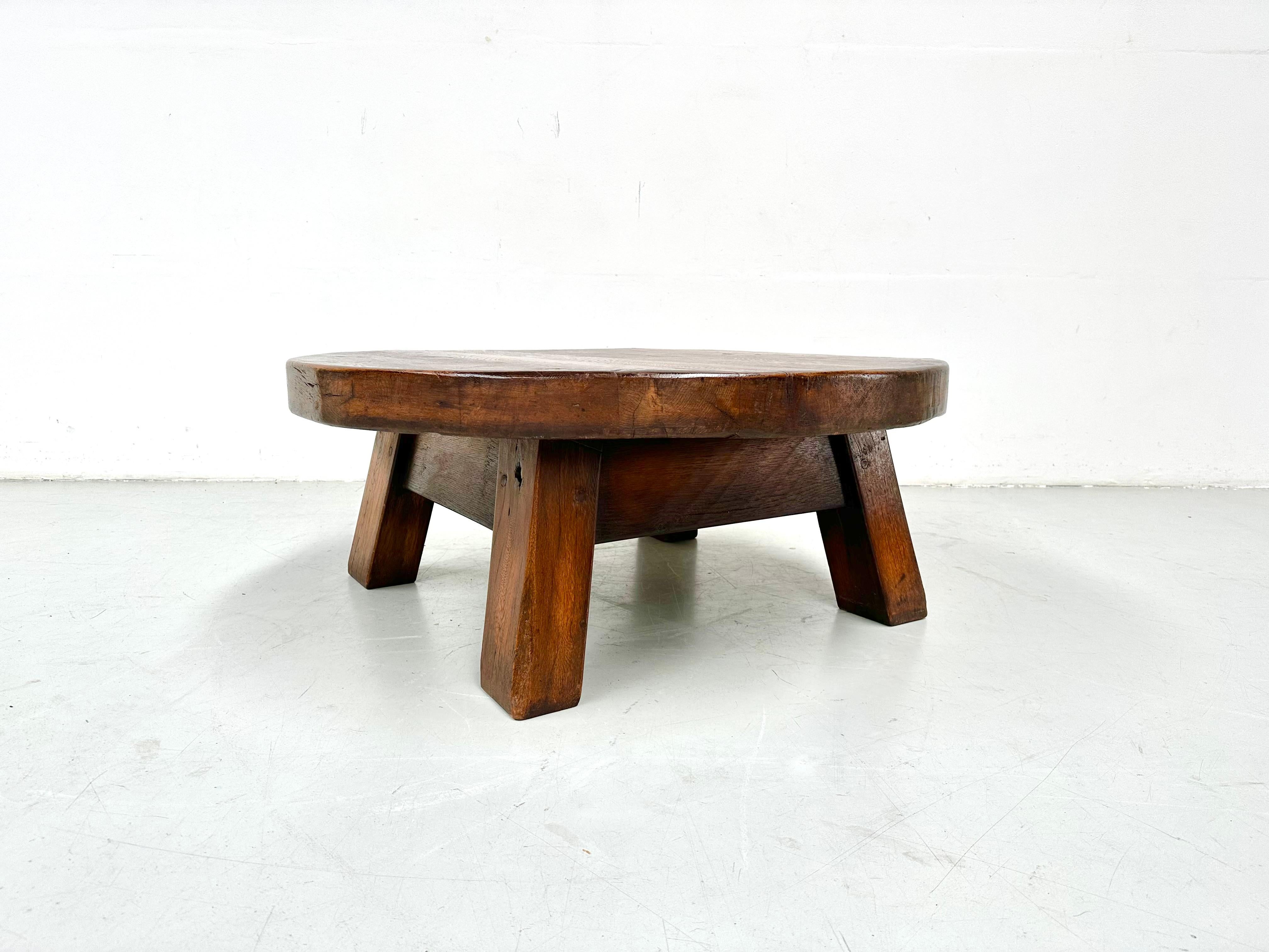 A stunning rural brutalist coffee table handmade in France around the twenties.

The table top is removable from the base and has a thickness of 3.54 inches.

In very good condition with great patina.