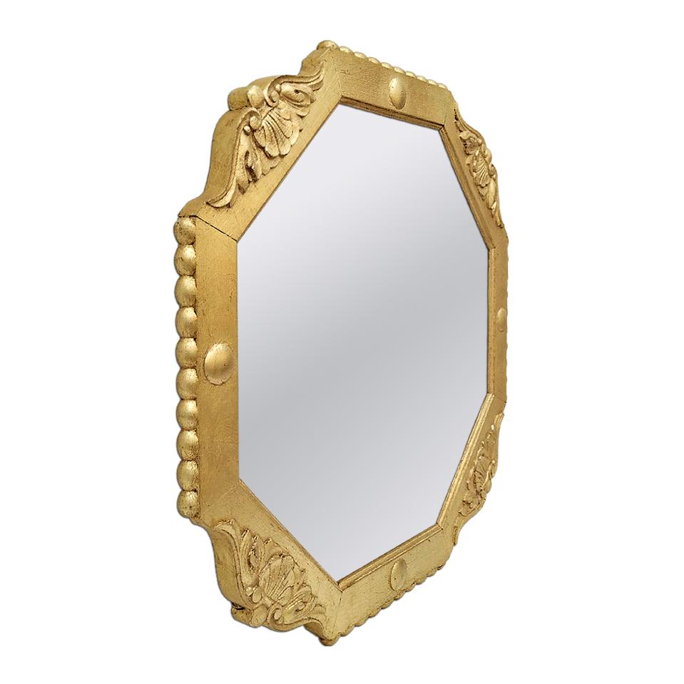 Antique octagonal giltwood mirror with carved shells and round in relief decors. Re-gilding to the leaf patinated. Modern glass mirror. Antique wood back. Antique frame width 6 cm / 2.36 in.
