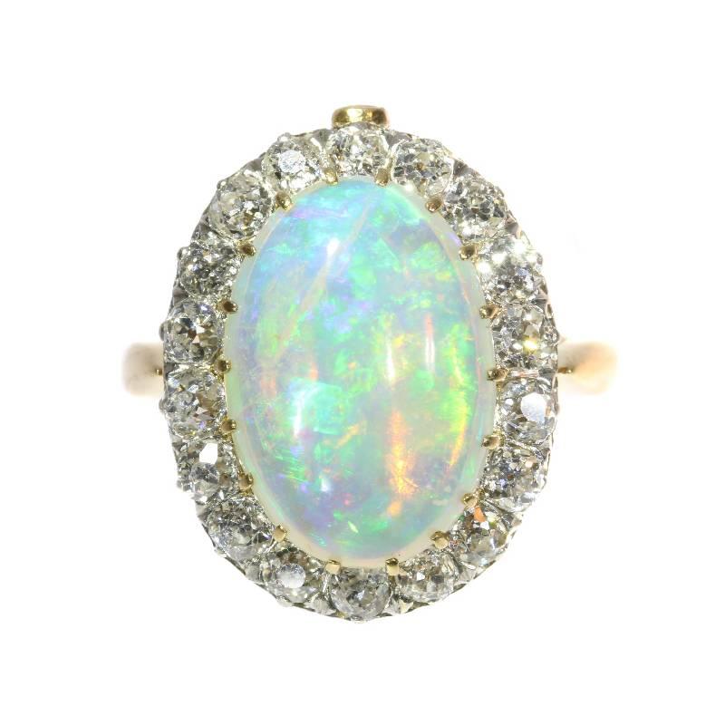 Antique jewelry object group: Ring and necklace. The diamond cluster with opal center can be attached on top of the ring or on the pendant of the necklace.

Condition: excellent condition

Ring size Continental: 50 & 16 , Size US 5¼ , Size UK: J½
-
