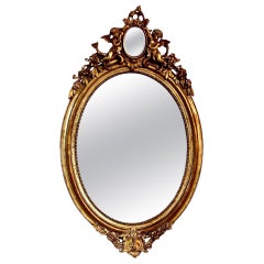 French Antique Oval Giltwood Mirror with Cherubs