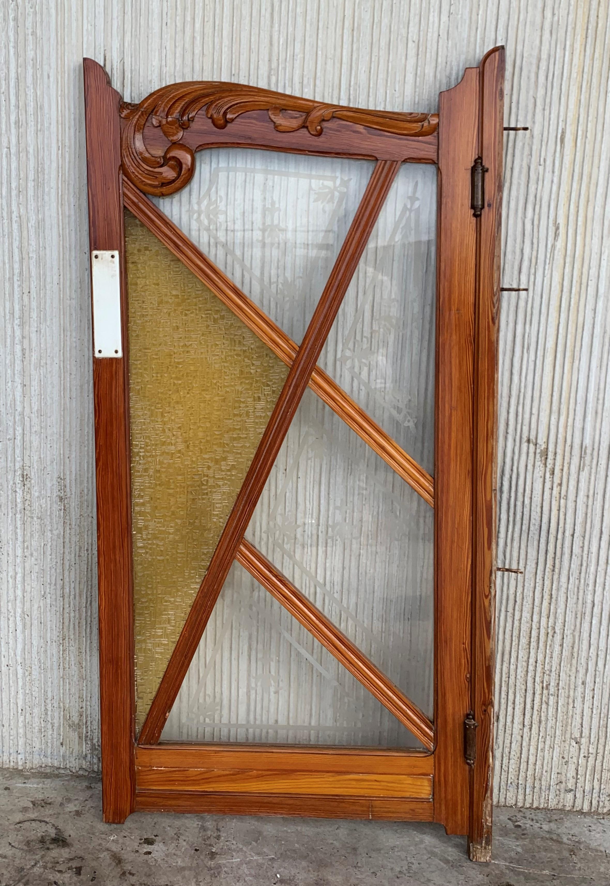 So many uses for this stained and beveled glass tiger cut oak pub or salon door. Entrance to your home bar, pantry or just a divide from one section of your home to another. The side wood pieces are the jamb for the door. It is meant to hang in a