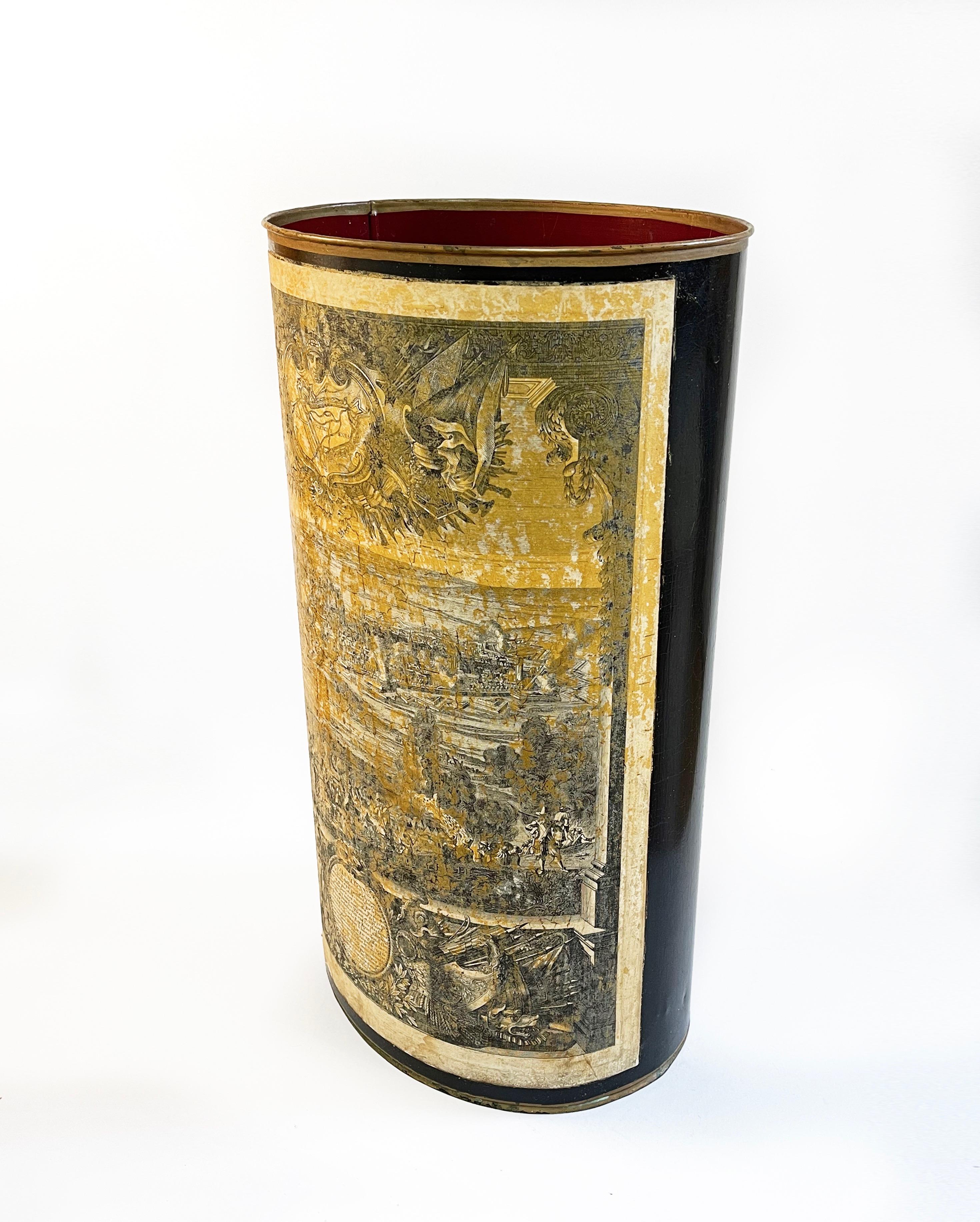 Fantastic umbrella stand in craquelure black with gold coloured detail and an impressive original antique
copper engraving print of Valencia with added patina in a golden to amber tone.
The inner comes in a dark muted red.

This piece comes from the