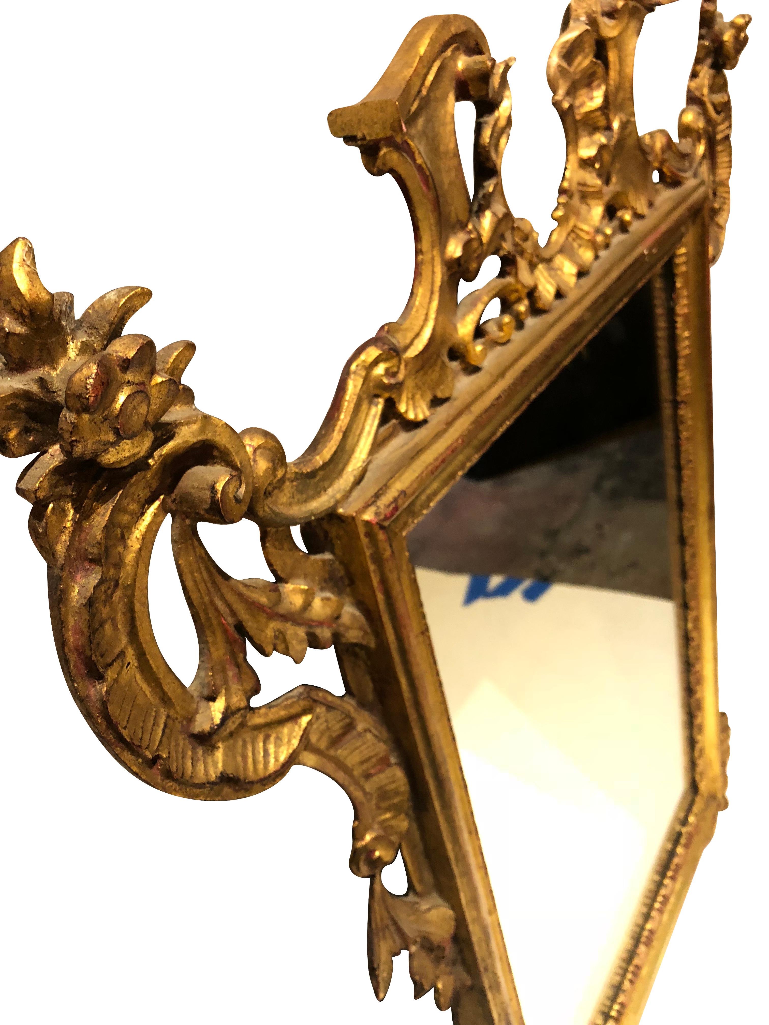 French antique Rococo style giltwood carved mirror
France, circa 1890
Framed: Height 32, width 24