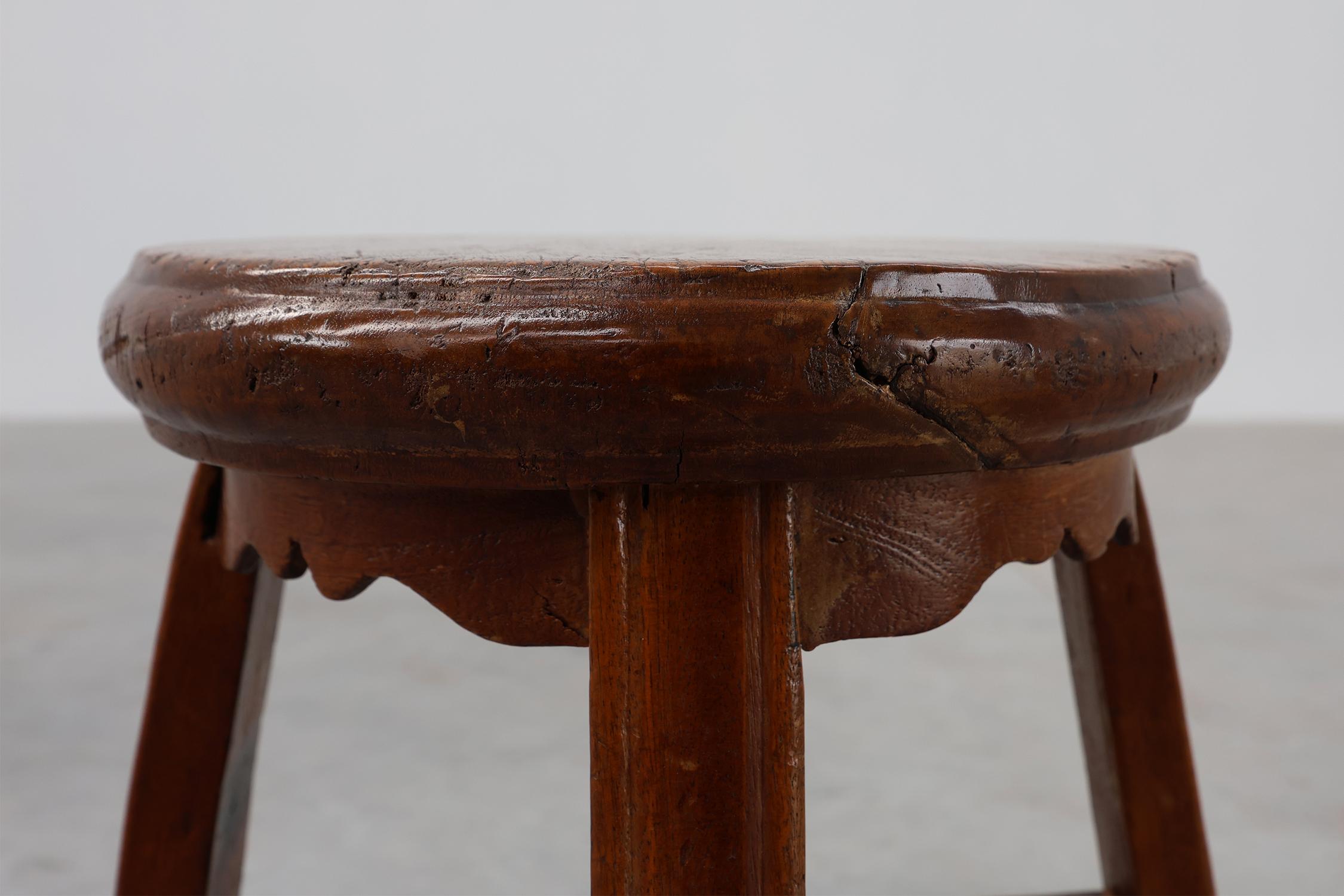 France / 1850 / stool / oak / Rustic / Antique

Antique dark colored round low stool with 4 legs in solid oak. Crafted in the mid 19th century in France.

This stool boasts a natural finish that highlights the unique grain patterns, making each