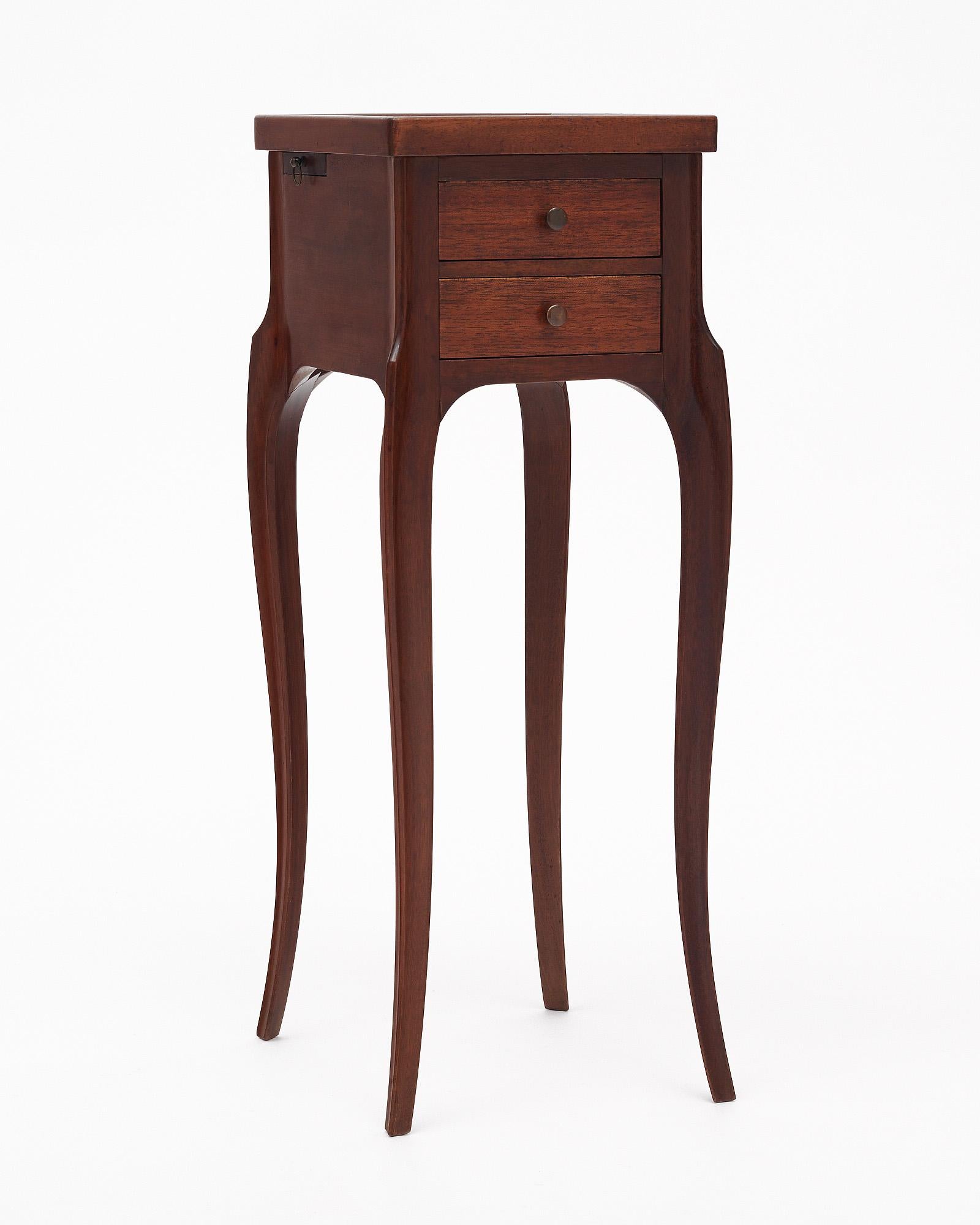 Side table from France made of walnut with long “cabriole