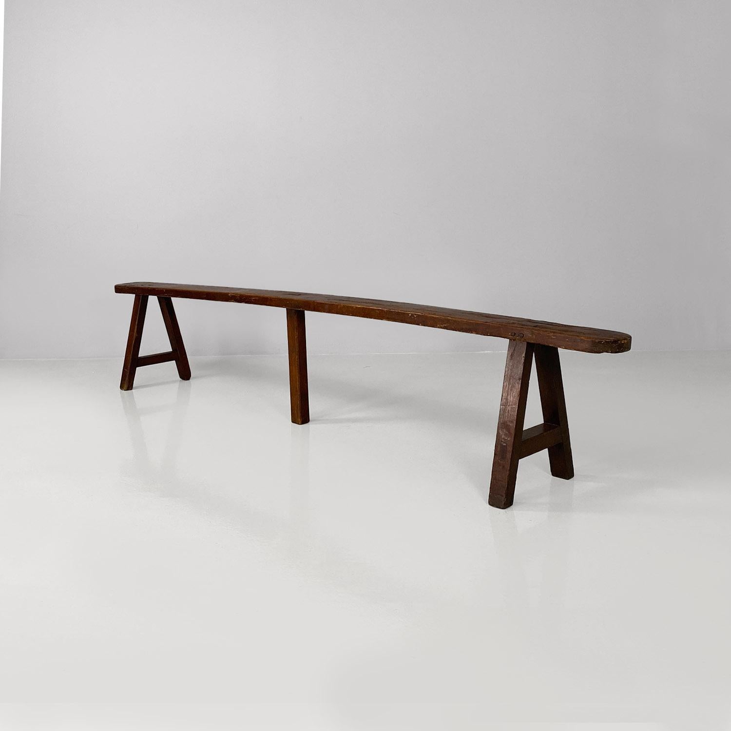 Mid-20th Century French antique soldid wood bench with narrow and long seat, 1930s For Sale